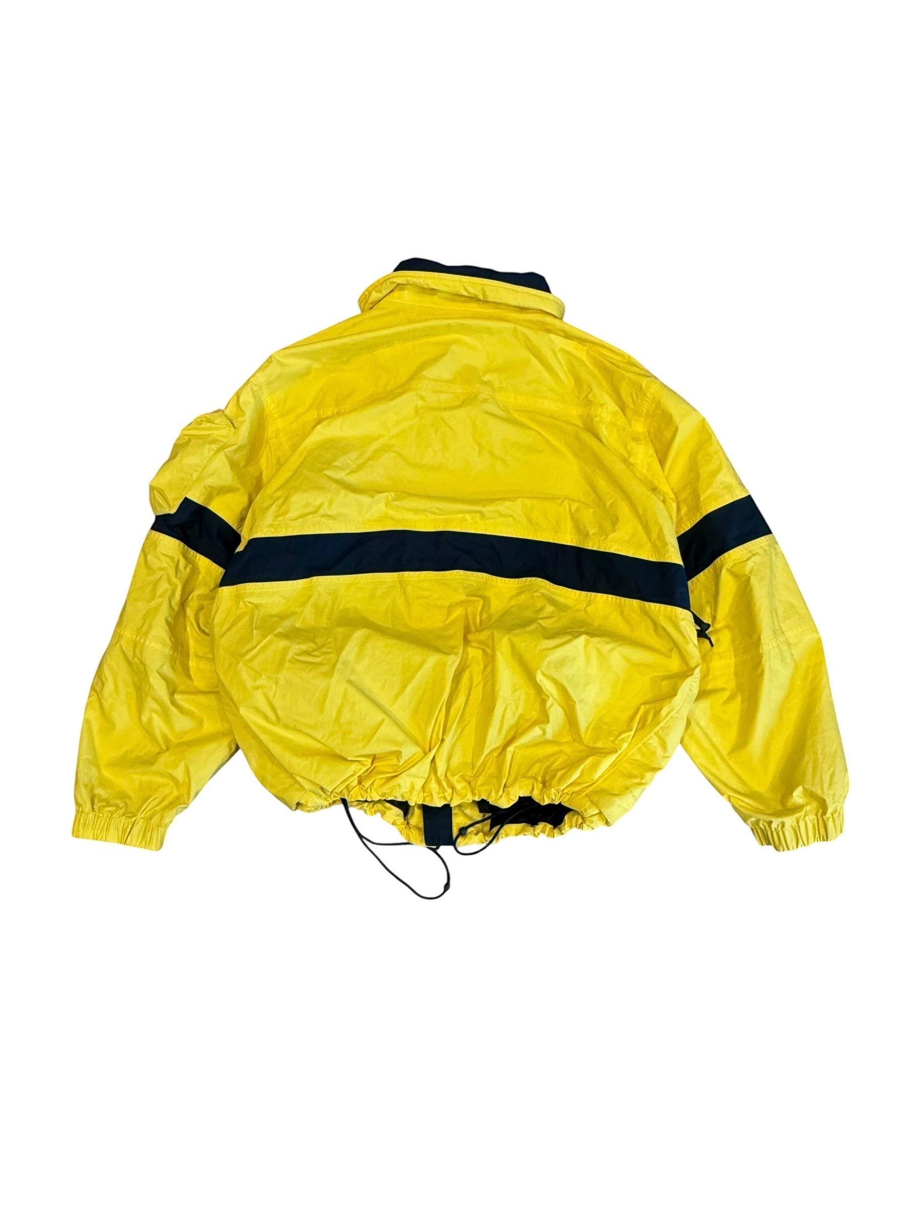 Archive No. 9 yellow Nike ACG ski jacket with black stripe detail, size Large. Durable and warm for cold weather.