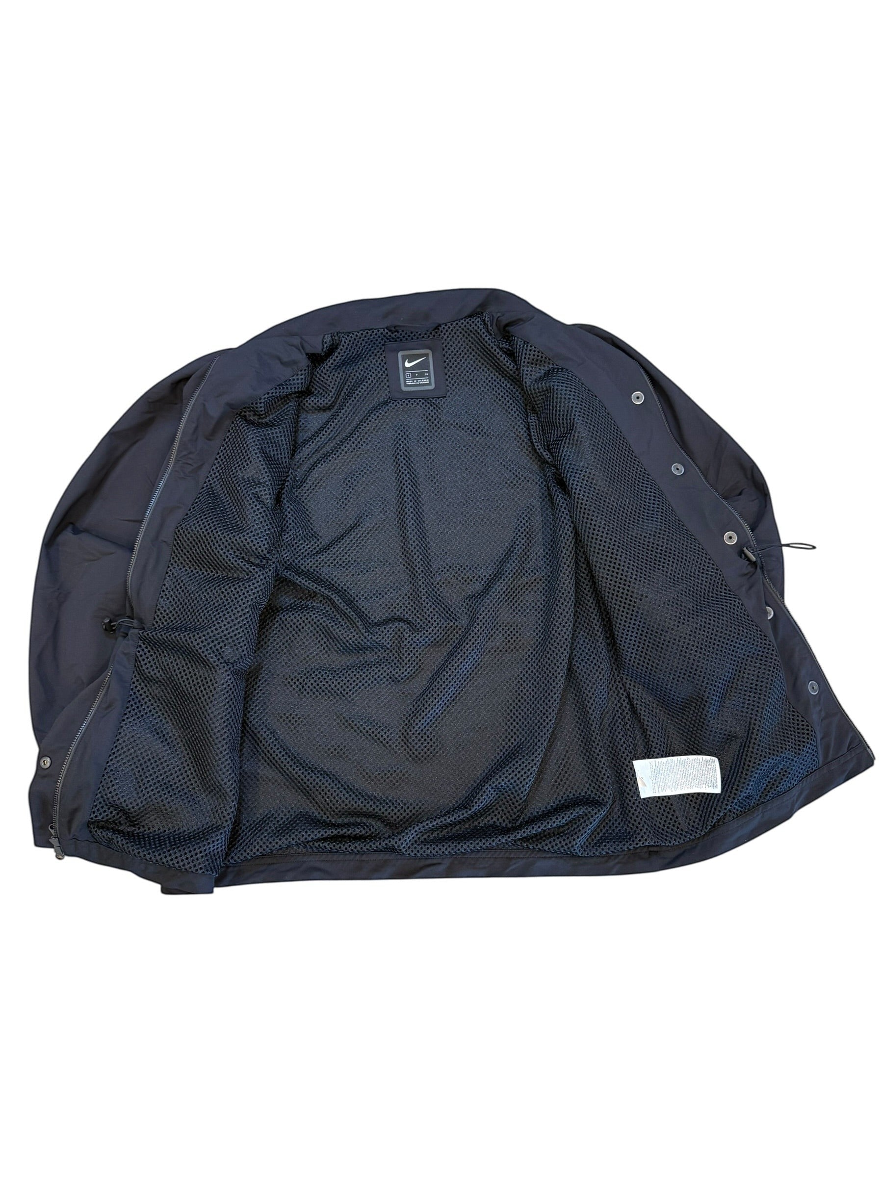 Archive No.9 black Nike utility jacket with elasticated exterior and breathable mesh lining, size Small.