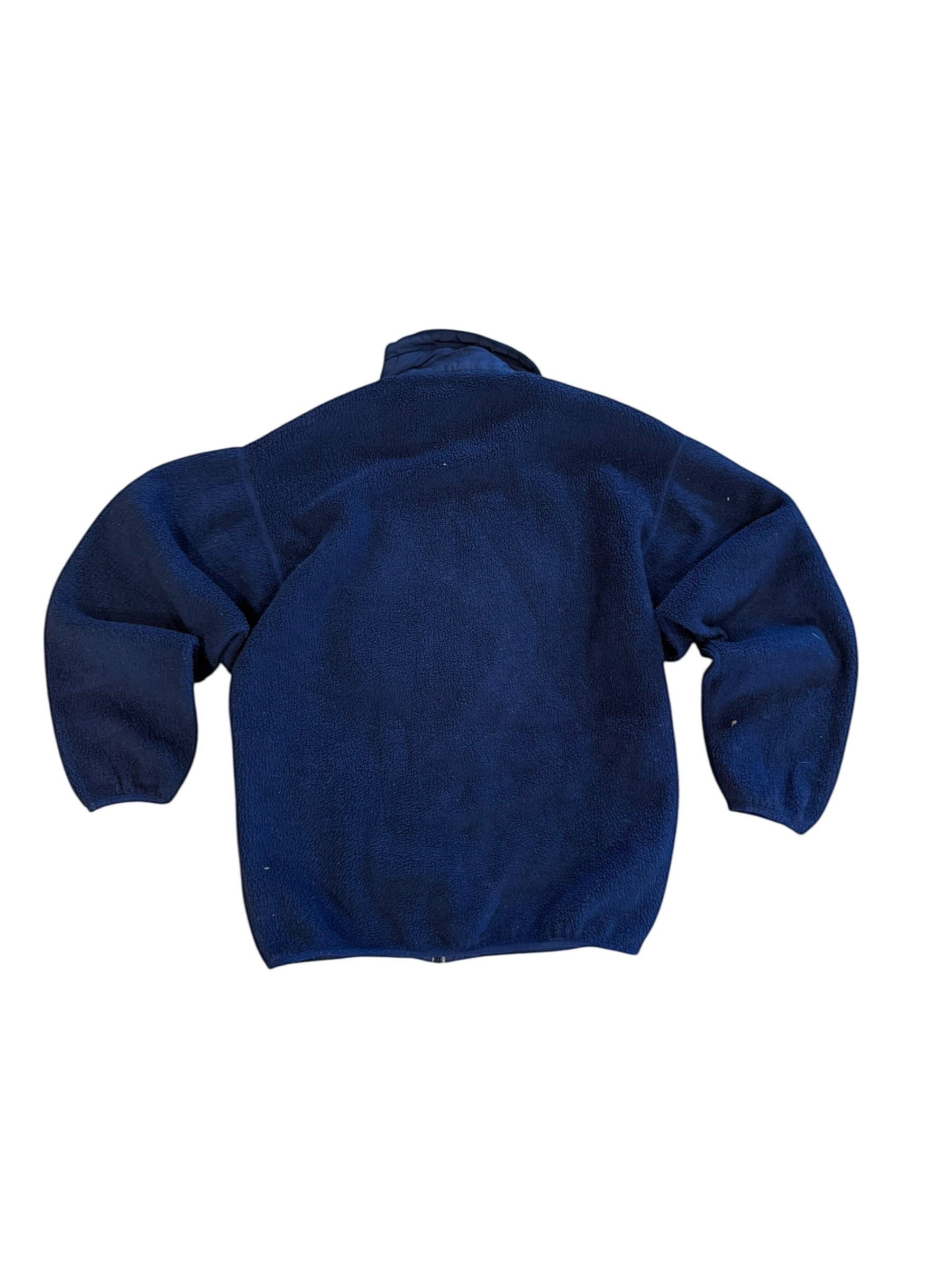 Archive No. 9 Patagonia navy fleece jumper, size M, with fleeced exterior and mesh lining.