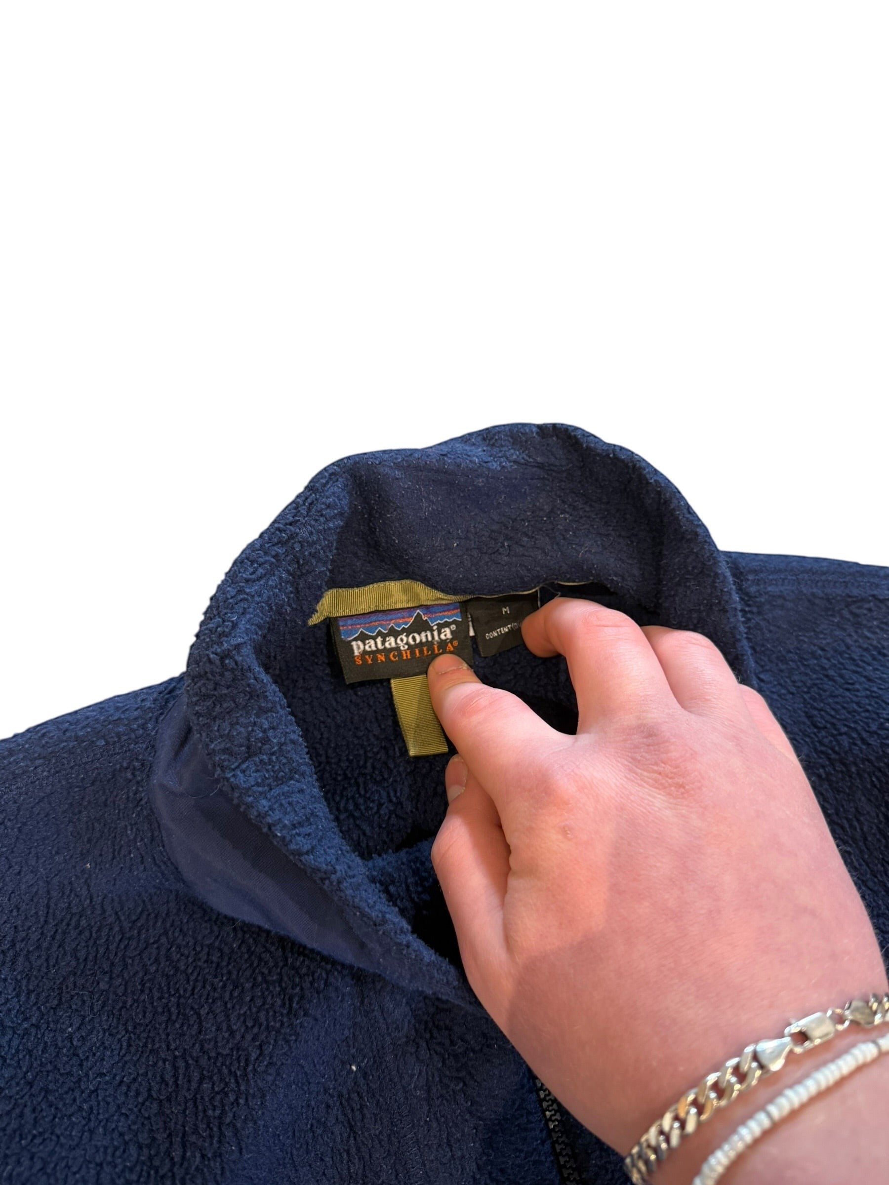 Archive No. 9 Patagonia navy blue fleece jumper, size M, with Synchilla fabric and mesh lining.