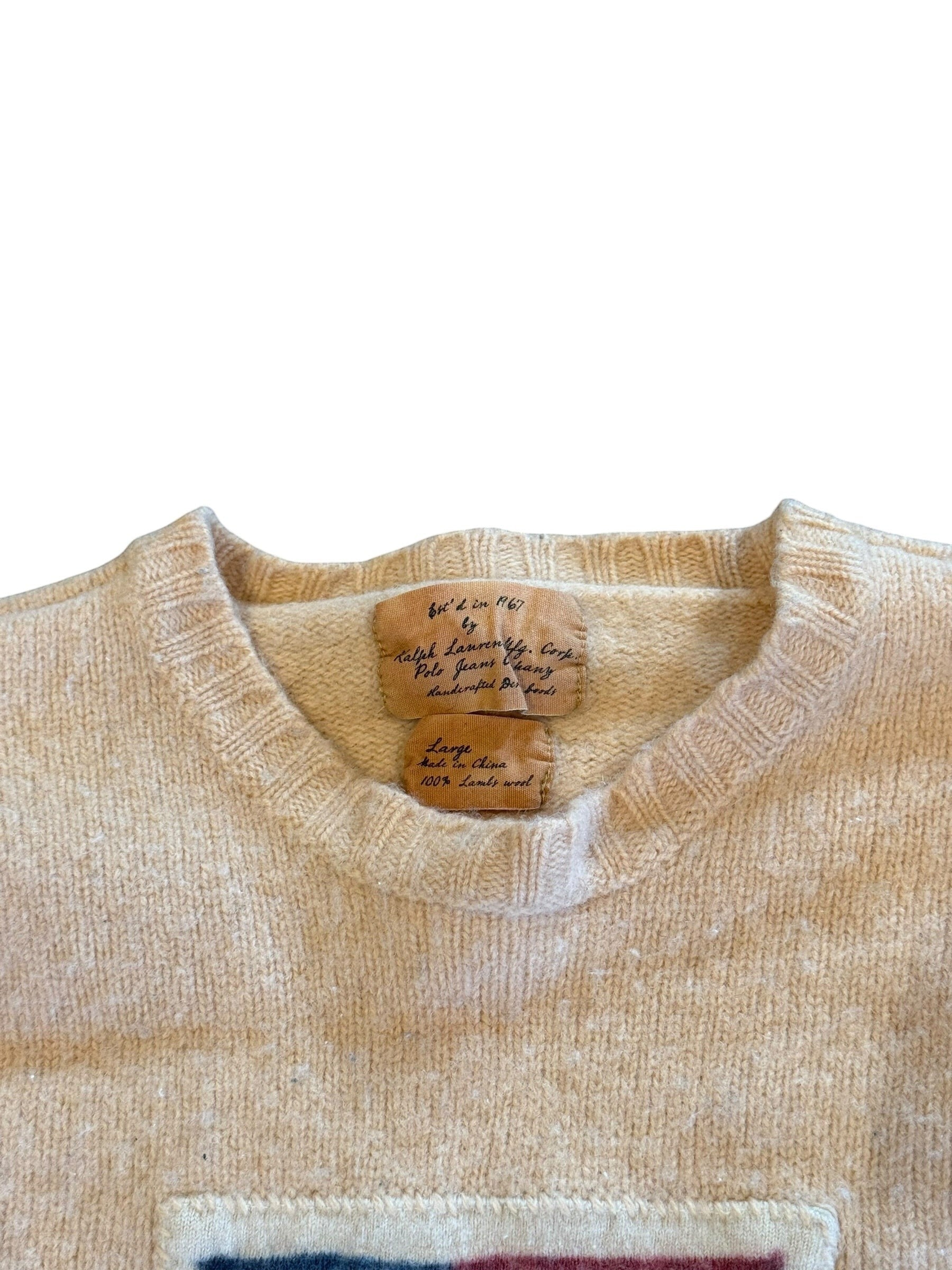 Archive No. 9 vintage Ralph Lauren cream lambswool crewneck sweater with a small chest pocket detail.