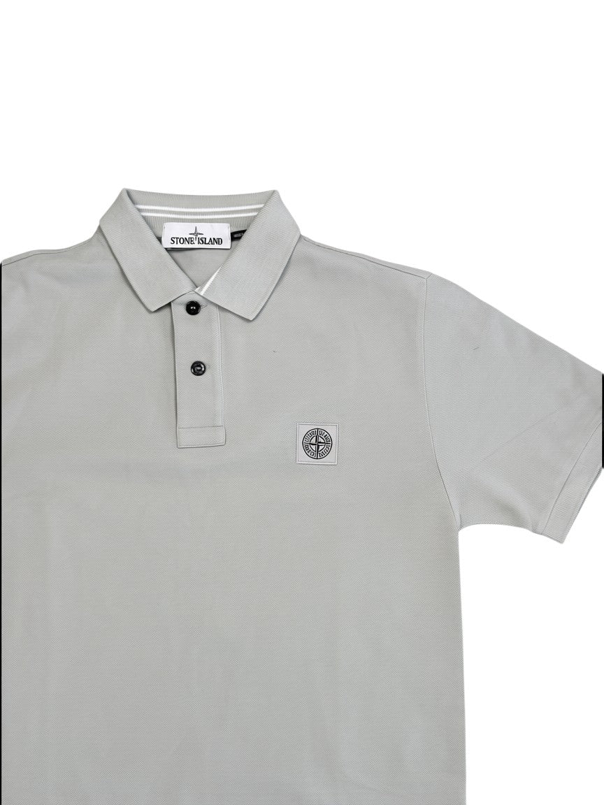 Archive No.9 Stone Island beige cotton polo shirt featuring the iconic compass logo patch on the chest.