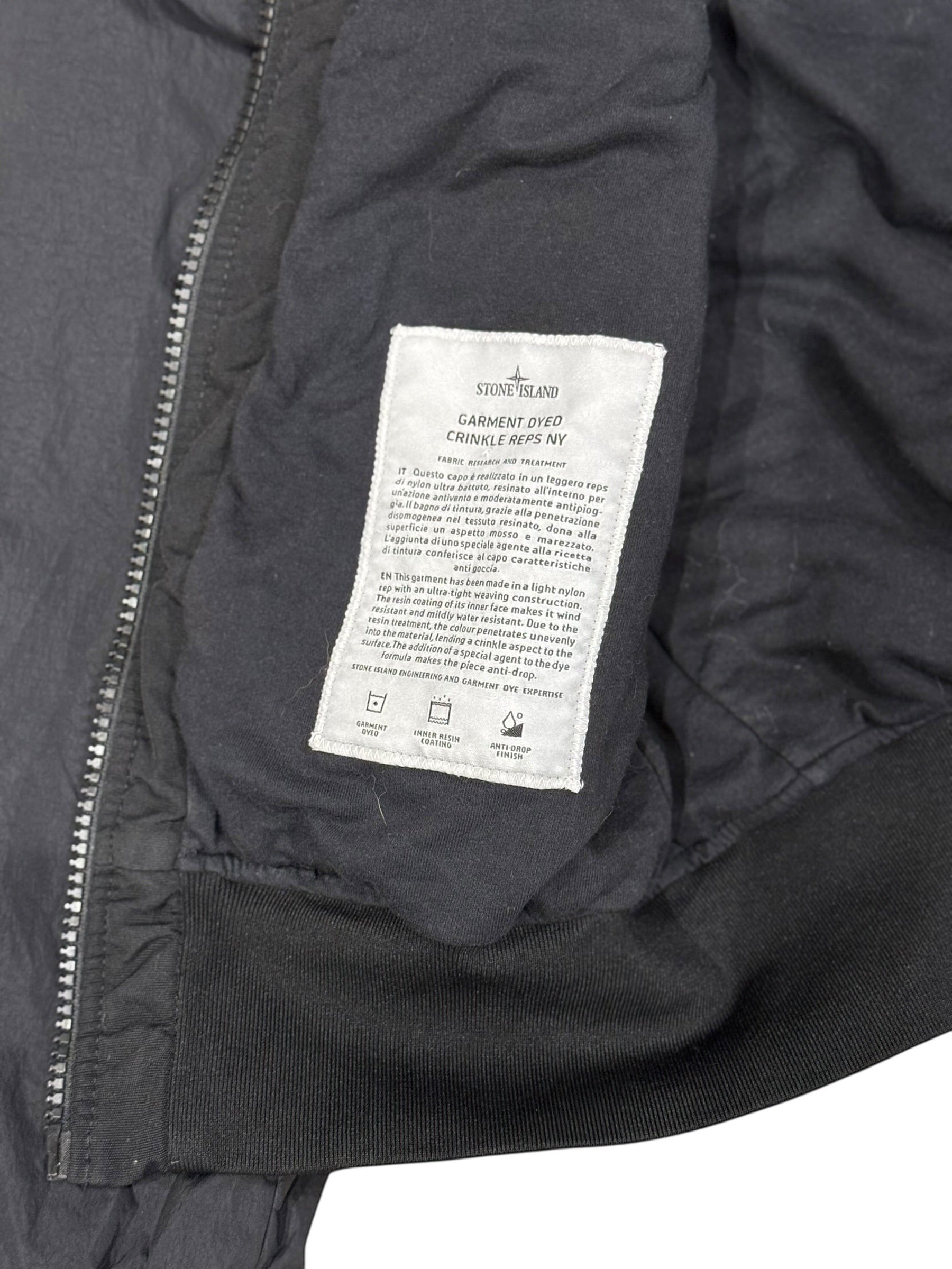 Archive No. 9 Stone Island black bomber jacket, size Medium, with wind and water-resistant properties and a rare Shadow Project badge.