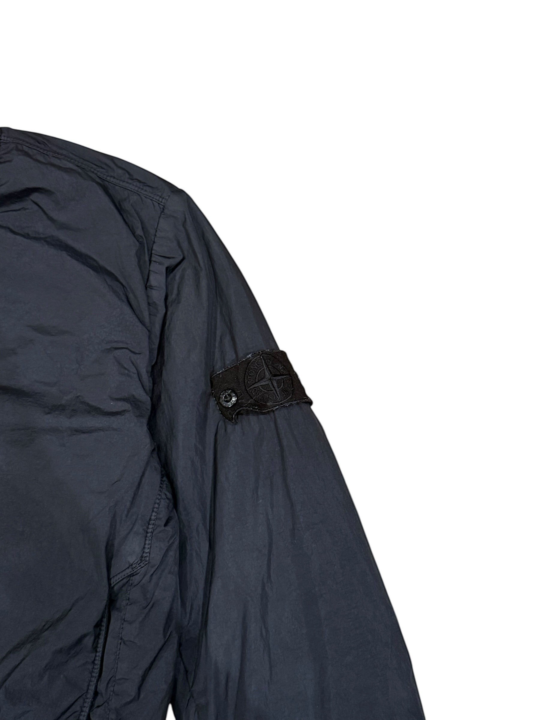Archive No. 9 Stone Island black bomber jacket with Shadow Project badge, wind and water-resistant.