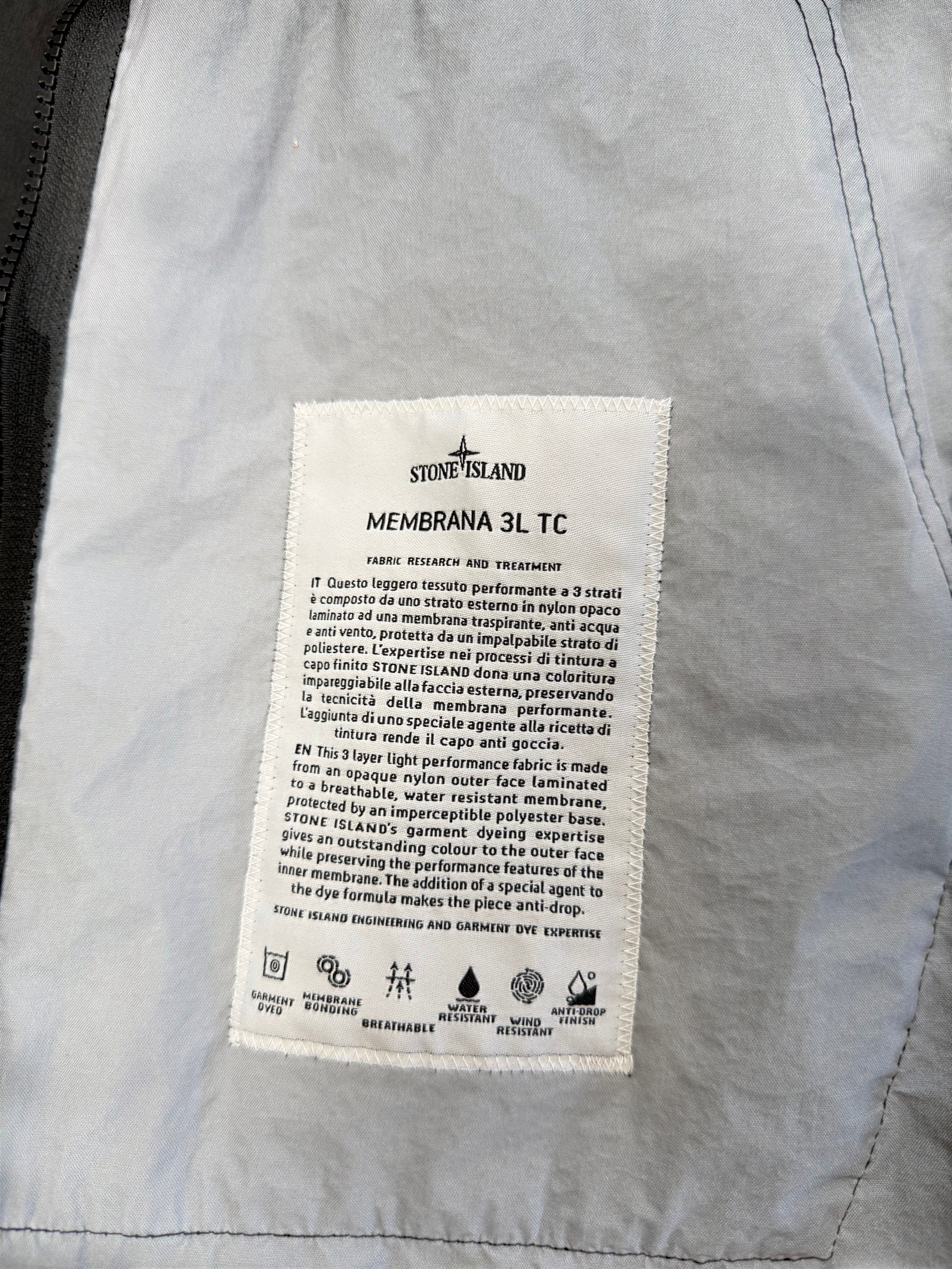 Archive No. 9 Stone Island black Membrana 3L TC waterproof jacket, size M. Features breathable, wind-resistant fabric.
