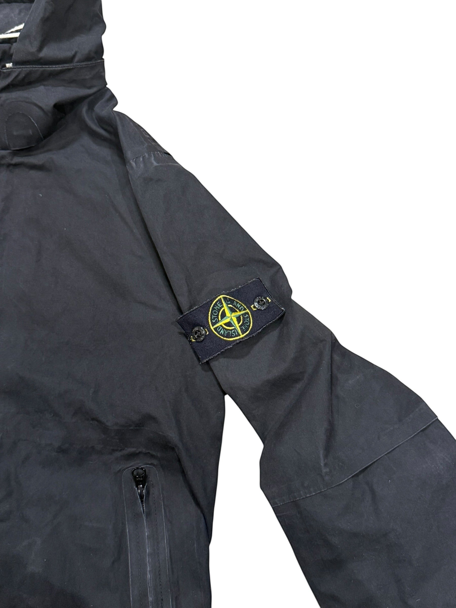Archive No. 9: Stone Island black Ventile shell jacket with zip-away hood and iconic compass badge on sleeve. Size M.