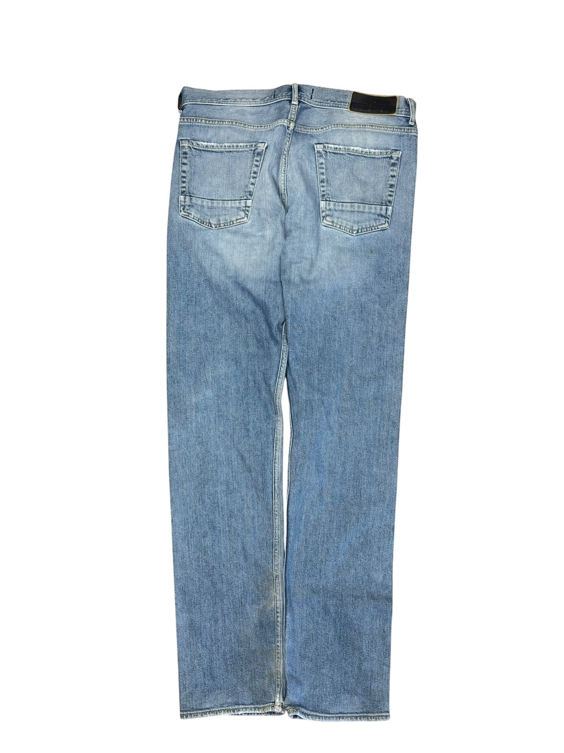 Archive No. 9 vintage blue 100% cotton Stone Island jeans, size W34, straight cut fit, with branded buttons and slight marks on back.