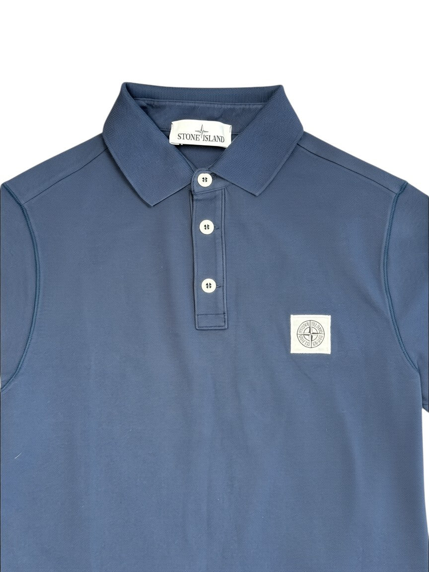 Archive No.9 Stone Island blue cotton polo shirt featuring a classic collar, button placket, and chest compass logo.
