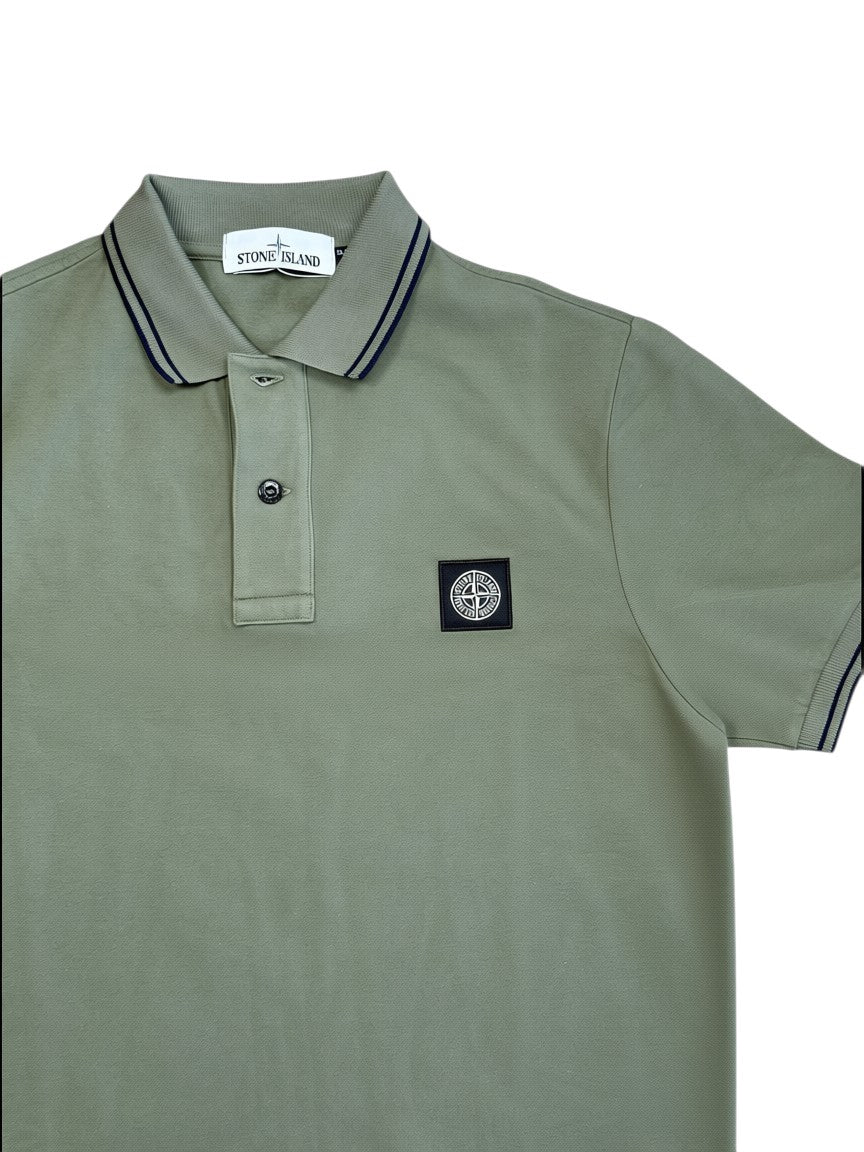 Archive No.9 Stone Island green slim fit cotton polo shirt with chest compass logo and striped collar detail.