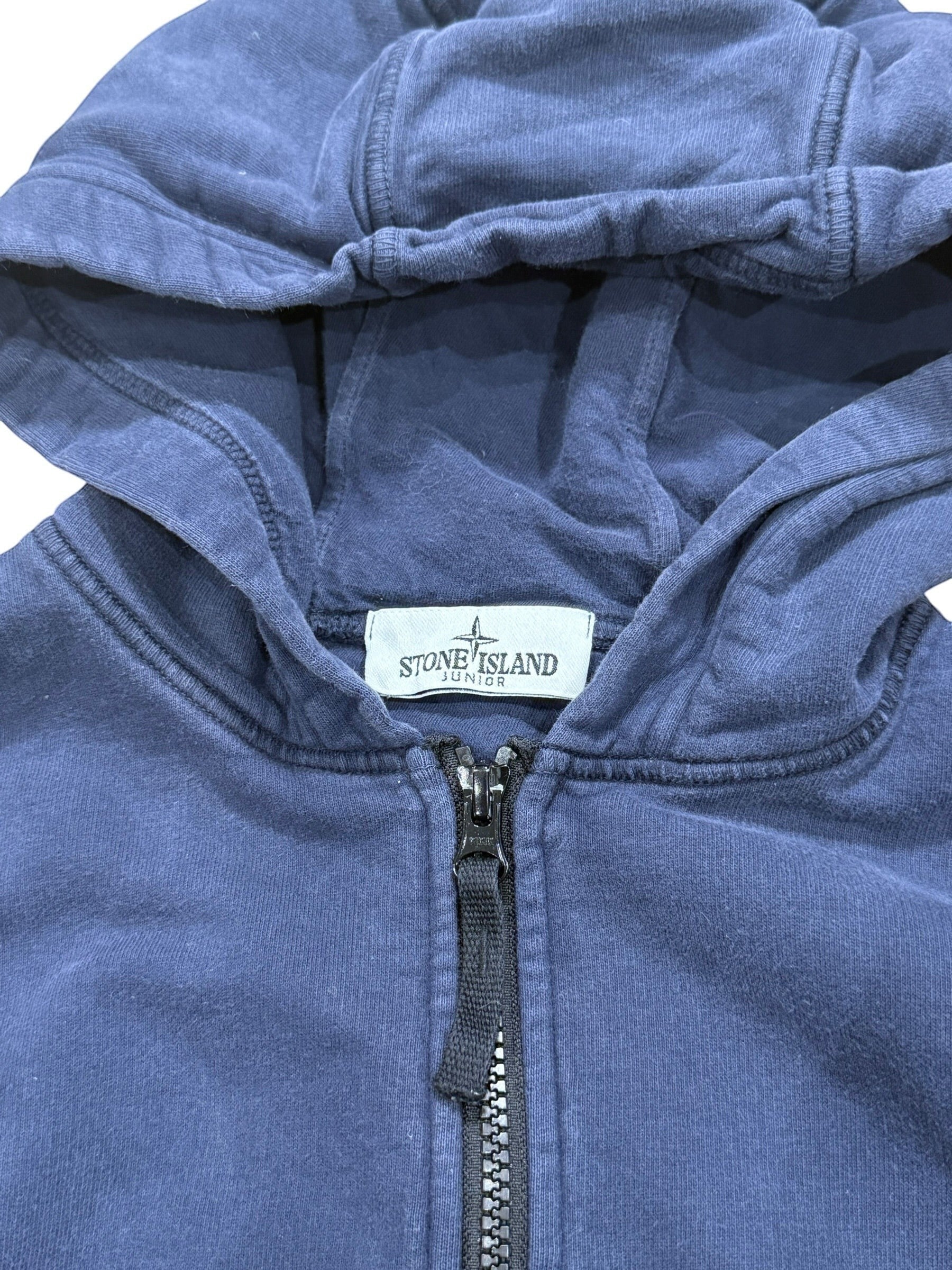 Archive No. 9 Stone Island Junior navy blue zip-up hoodie, size 12. Features a hood and fleeced interior.