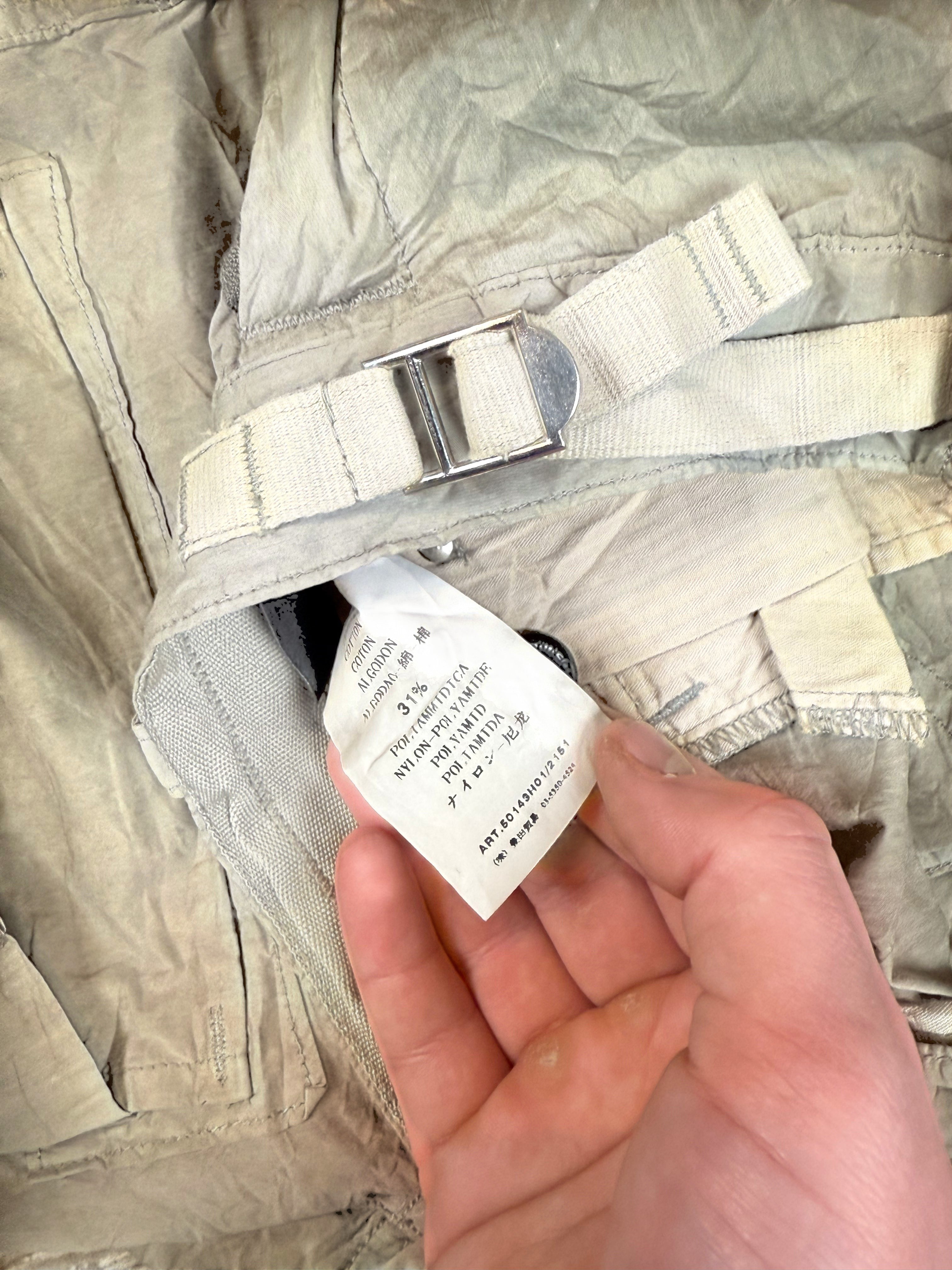 Archive No. 9 vintage Stone Island khaki technical cargo trousers with adjustable belt and lightweight fabric. Size W34.