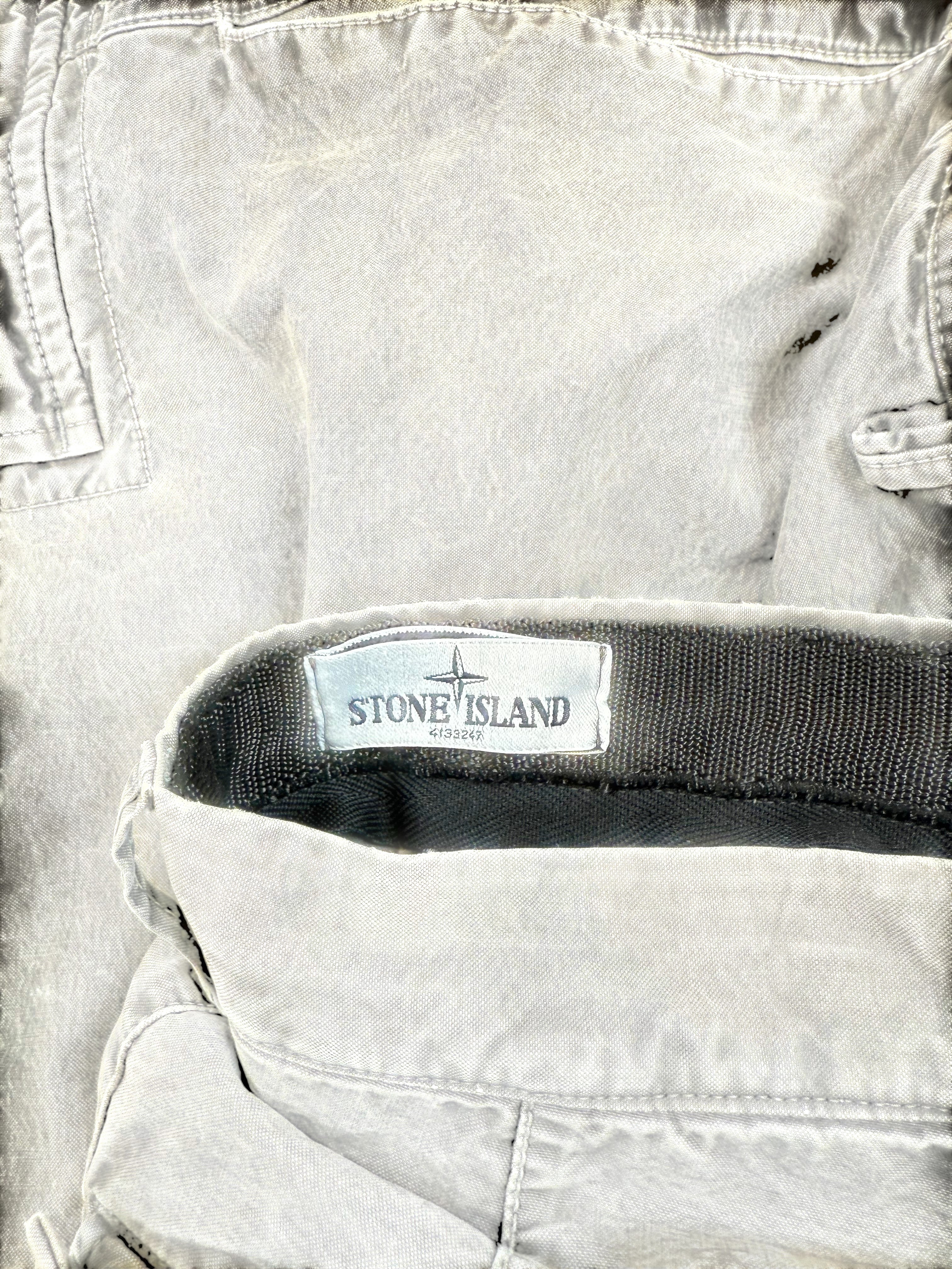 Archive No.9 Stone Island khaki denim cargo trousers W34 with multiple pockets and distressed finish.