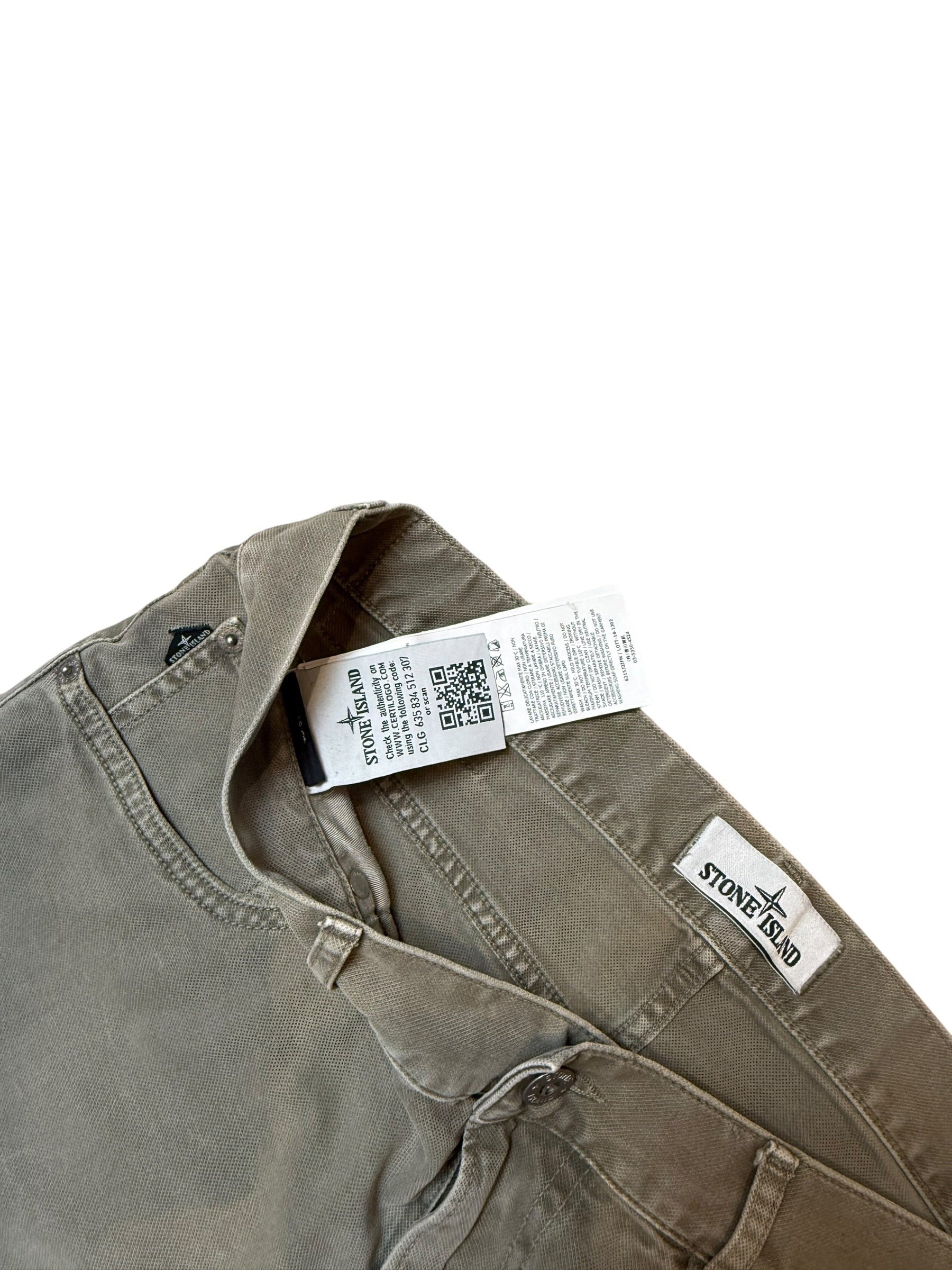 Archive No. 9 Stone Island khaki 100% cotton jeans, W31, with iconic compass badge on back pocket.