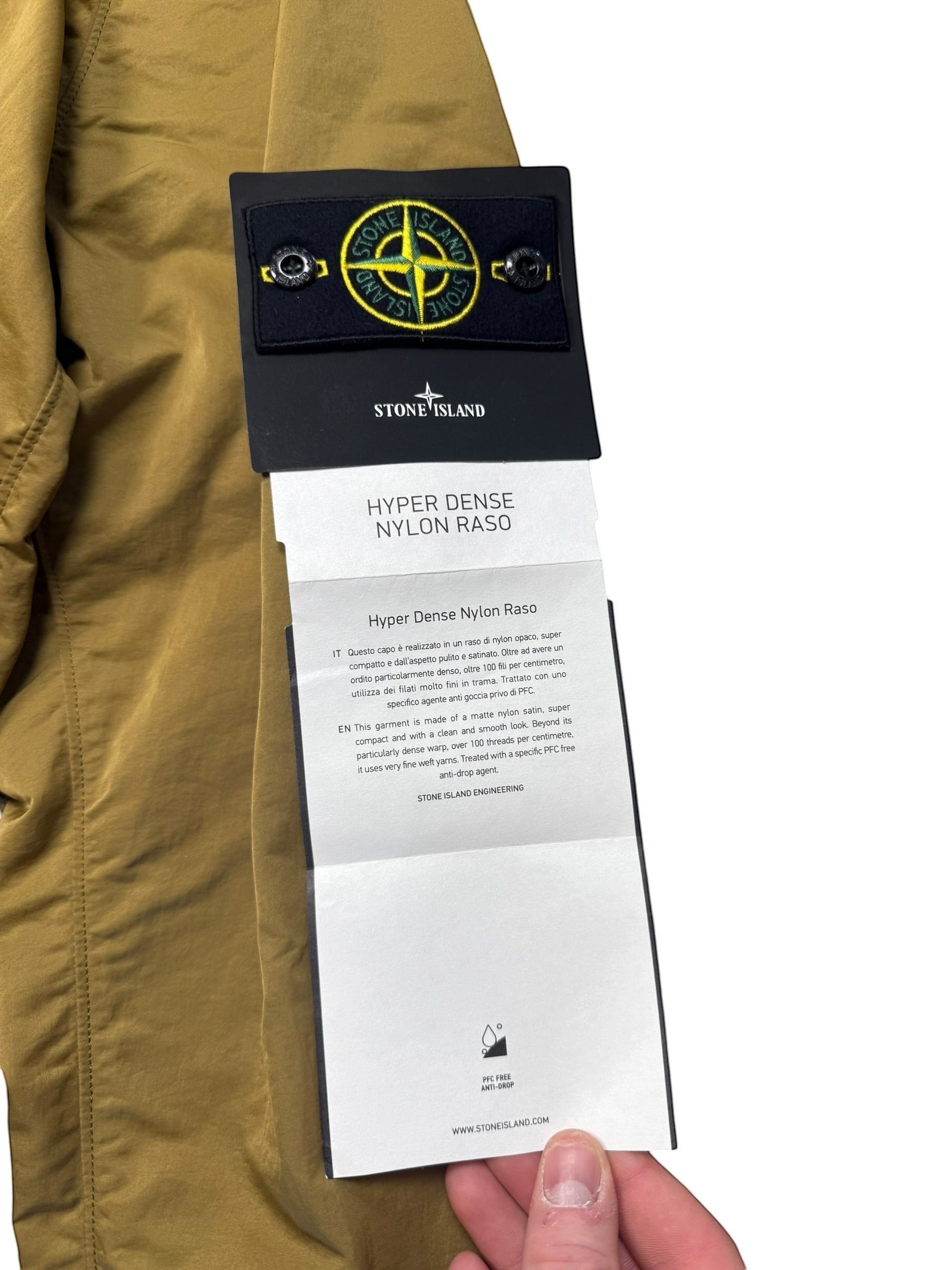 Archive No. 9 Stone Island Hyper Dense Nylon Raso windbreaker jacket in khaki, size L. Features PFC-free anti-drop finish.
