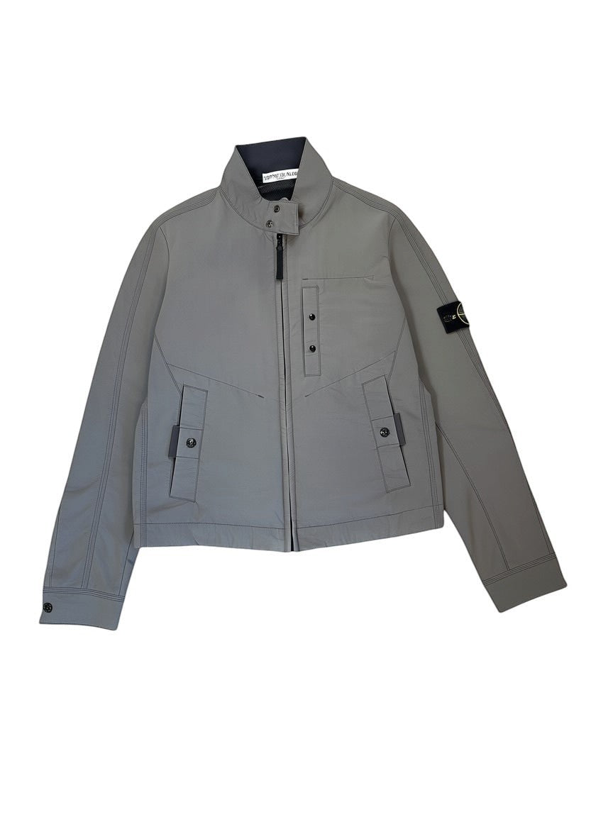Archive No. 9 Stone Island vintage khaki windbreaker jacket with mesh lining, size M. Waterproof and wind-resistant.