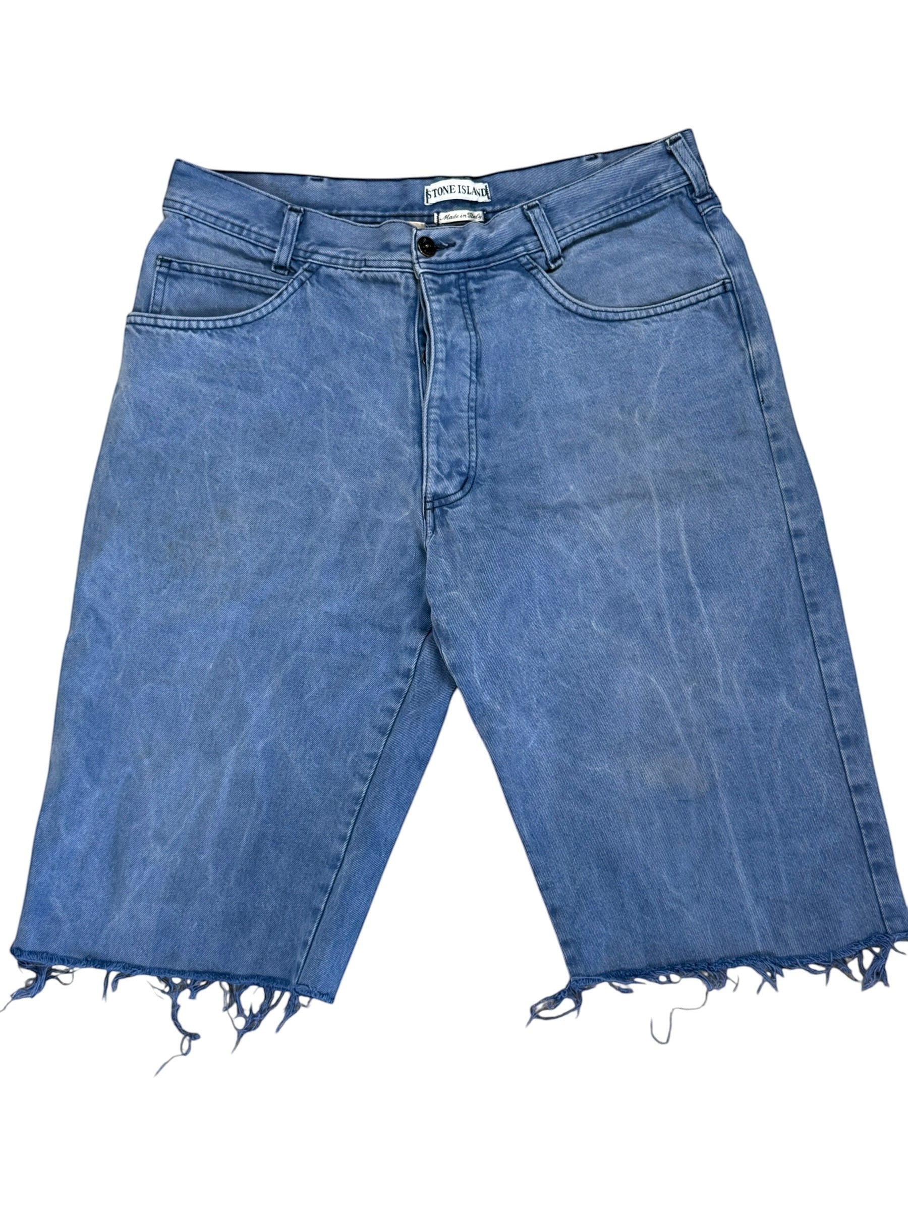 Archive No. 9 vintage Stone Island light blue denim shorts, size L, with raw frayed hems and iconic green edge badge.