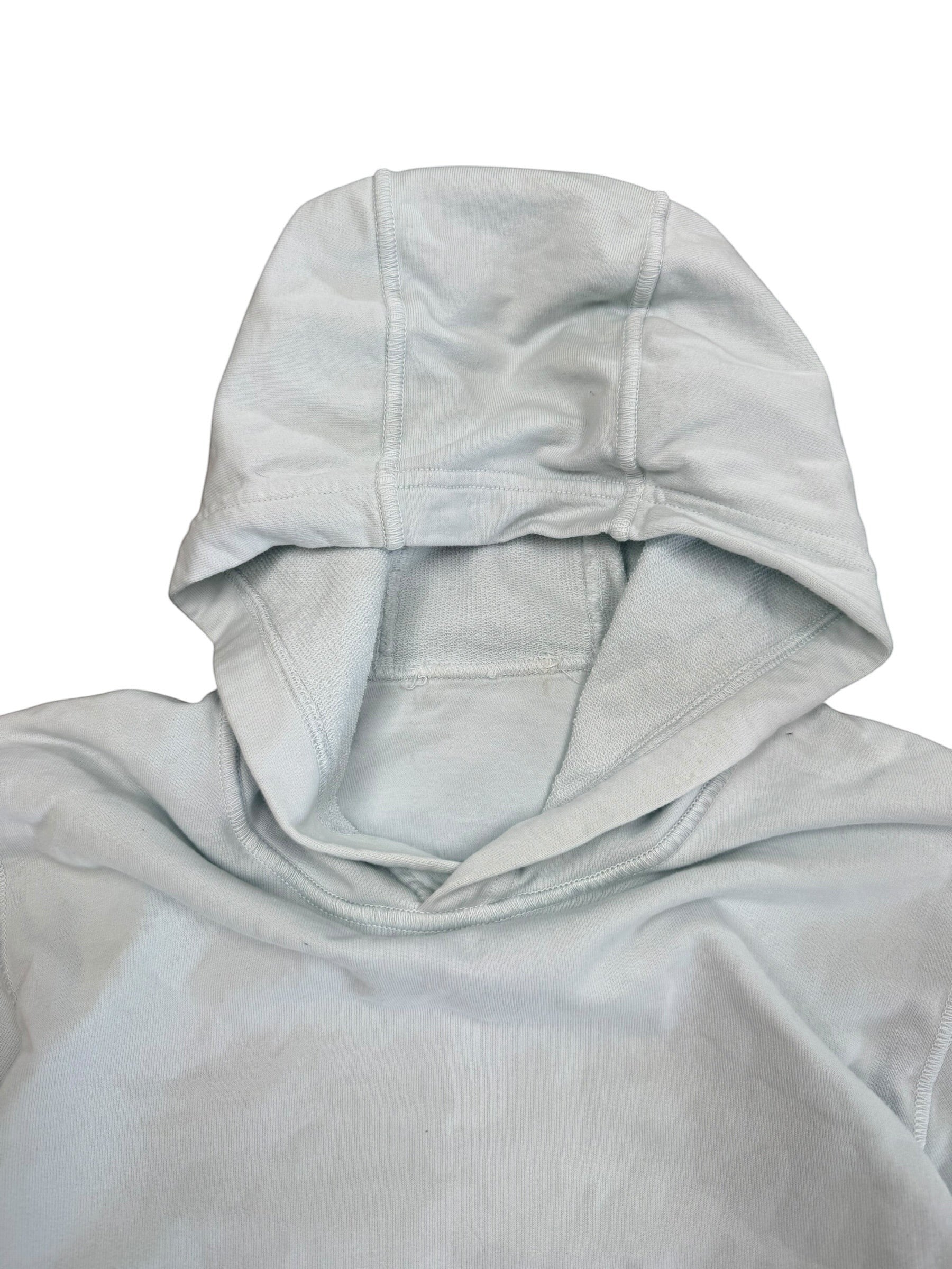 Archive No.9 light blue cotton Stone Island pullover hoodie with drawstring hood and ribbed cuffs. Size M.