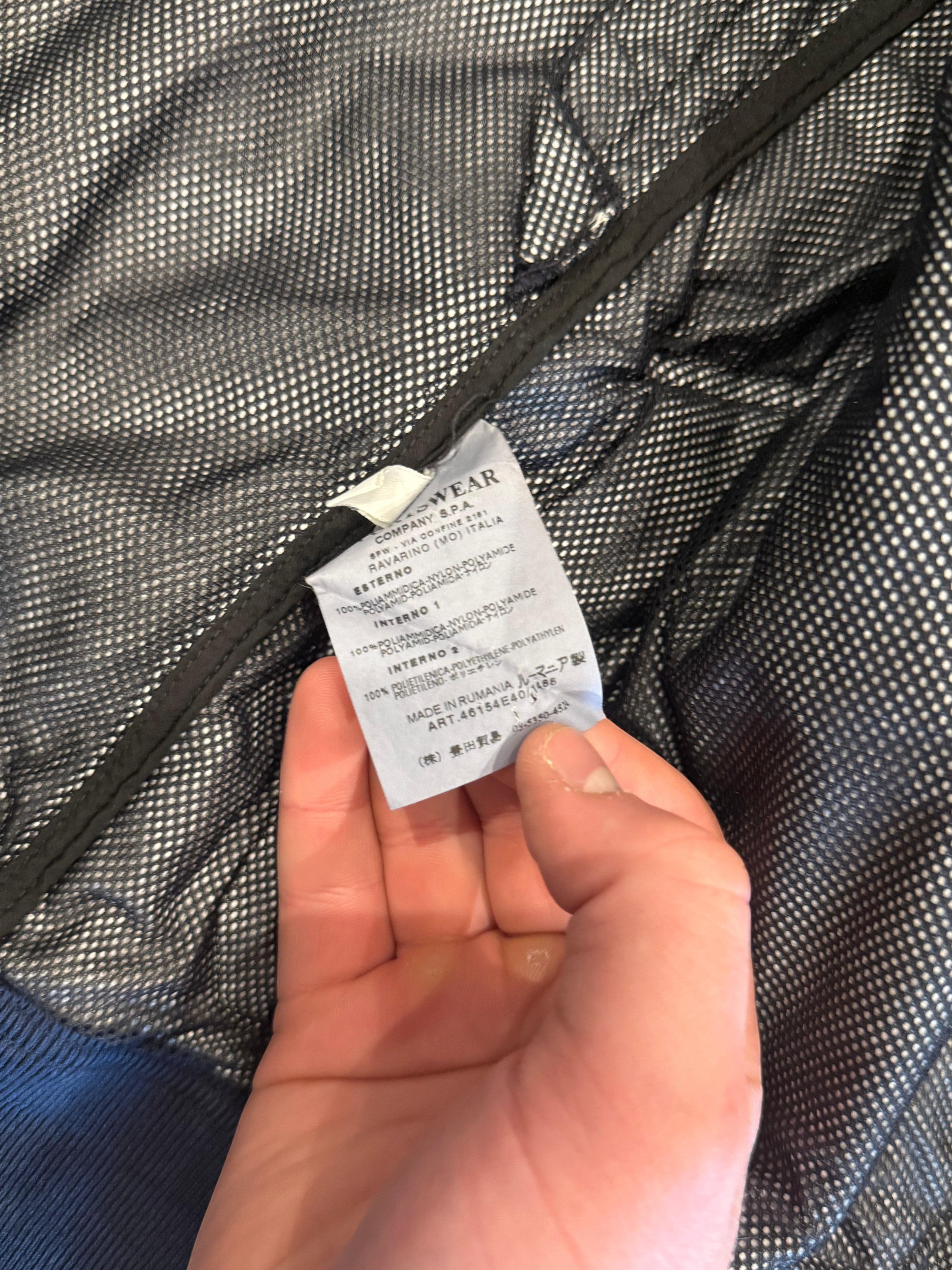 Archive No. 9 vintage Stone Island navy Nylon Metal bomber jacket, size S. Water and wind resistant.