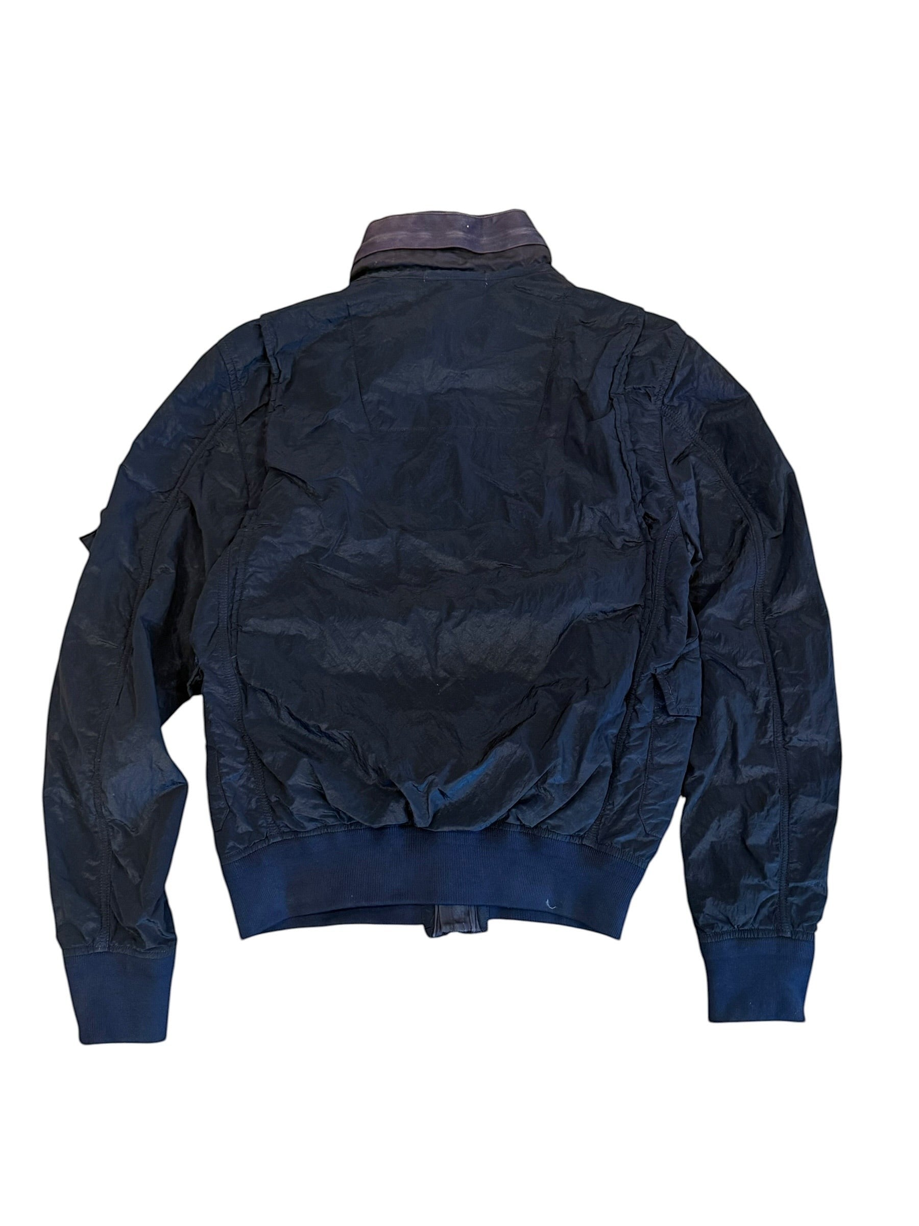 Archive No. 9 vintage navy blue Stone Island Nylon Metal bomber jacket with a brown collar detail. Water and wind resistant.