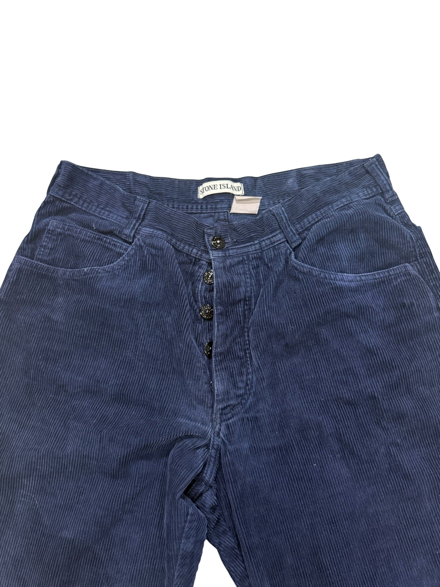 Archive No. 9 vintage navy velvet corduroy trousers by Stone Island. Features a 30-inch waist and button fly.