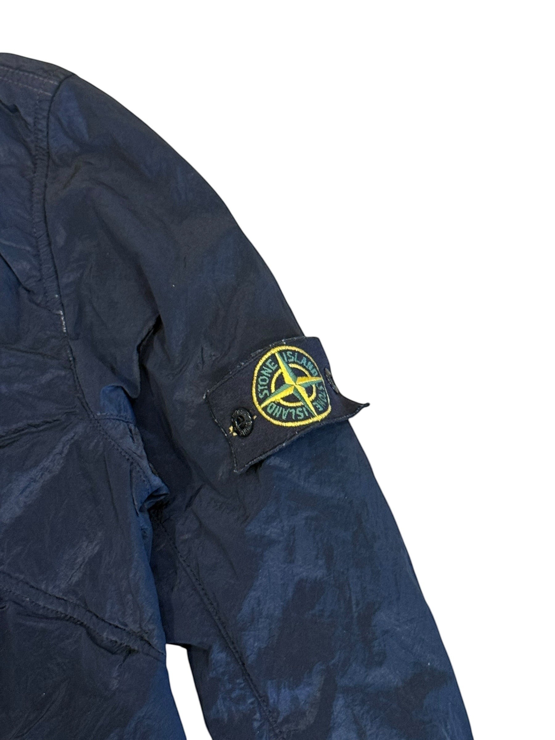 Archive No. 9 vintage navy blue Stone Island Nylon Metal bomber jacket with iconic compass badge on sleeve. Water and wind resistant.
