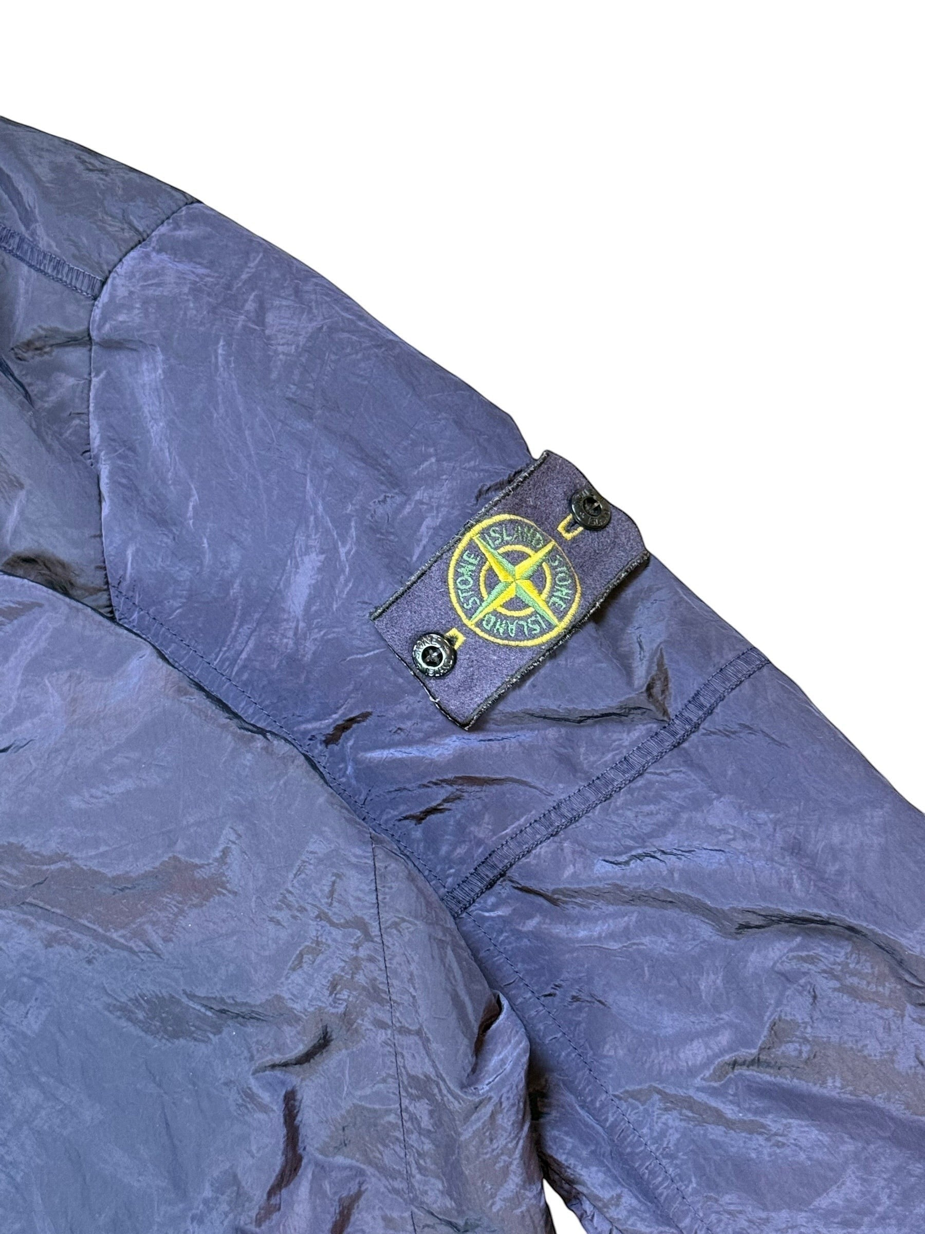 Archive No. 9 navy Stone Island nylon metal jacket, size M, lightweight technical design with signature compass badge.