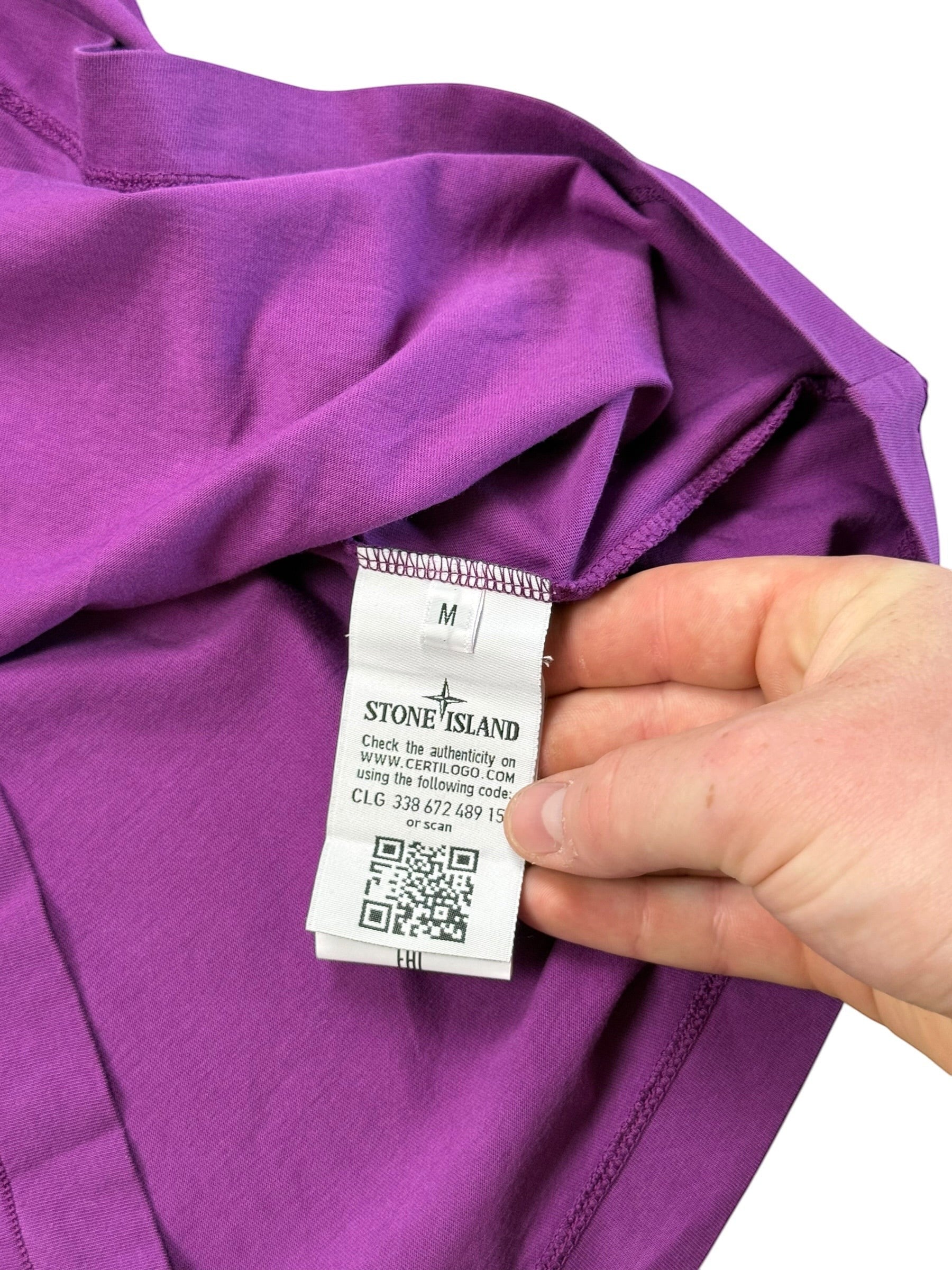 Archive No.9 Stone Island purple cotton T-shirt showing the interior size M label and Certilogo authenticity tag.