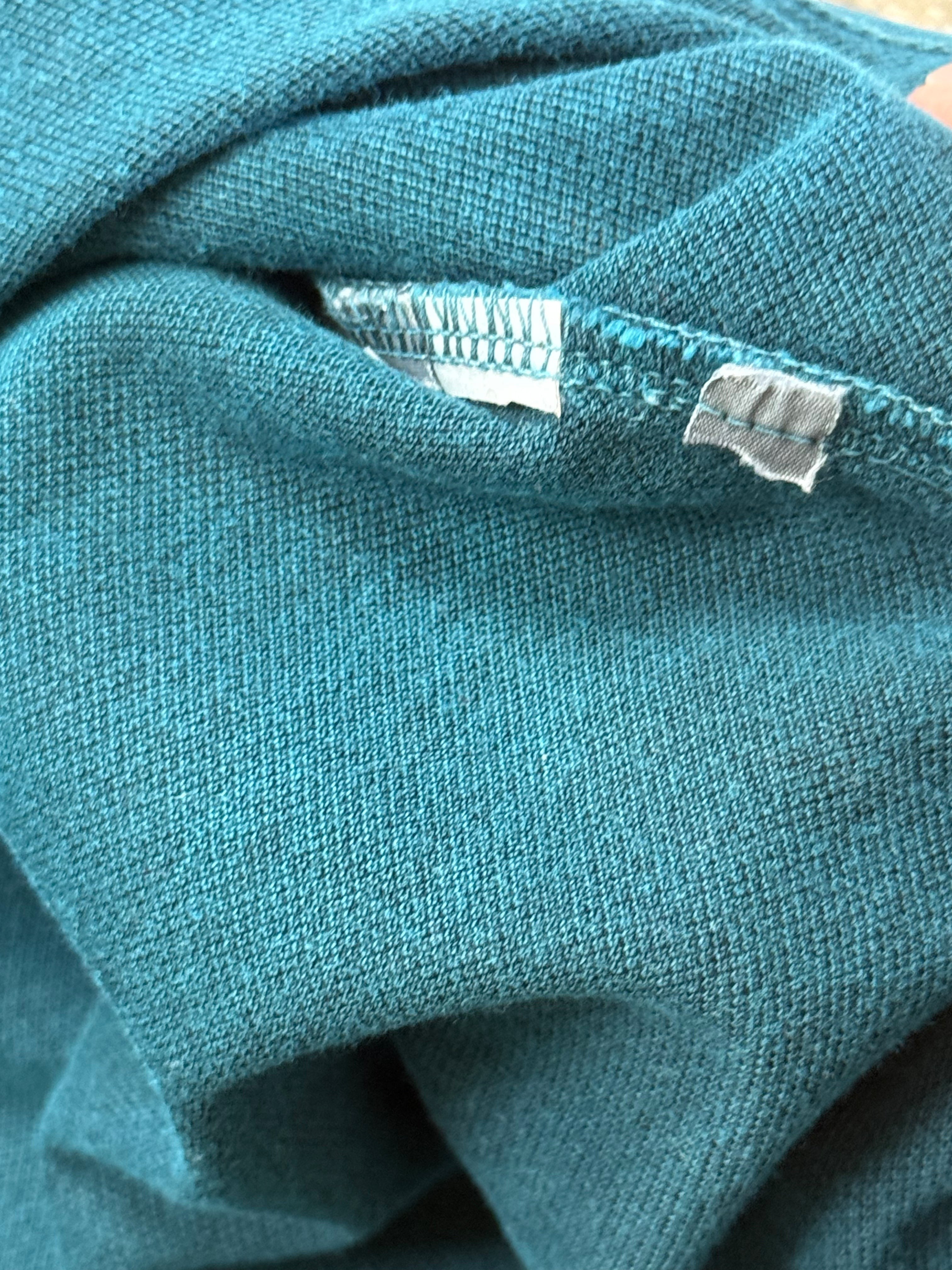 Archive No. 9 Stone Island slim fit turquoise cotton polo shirt with iconic compass logo on chest.