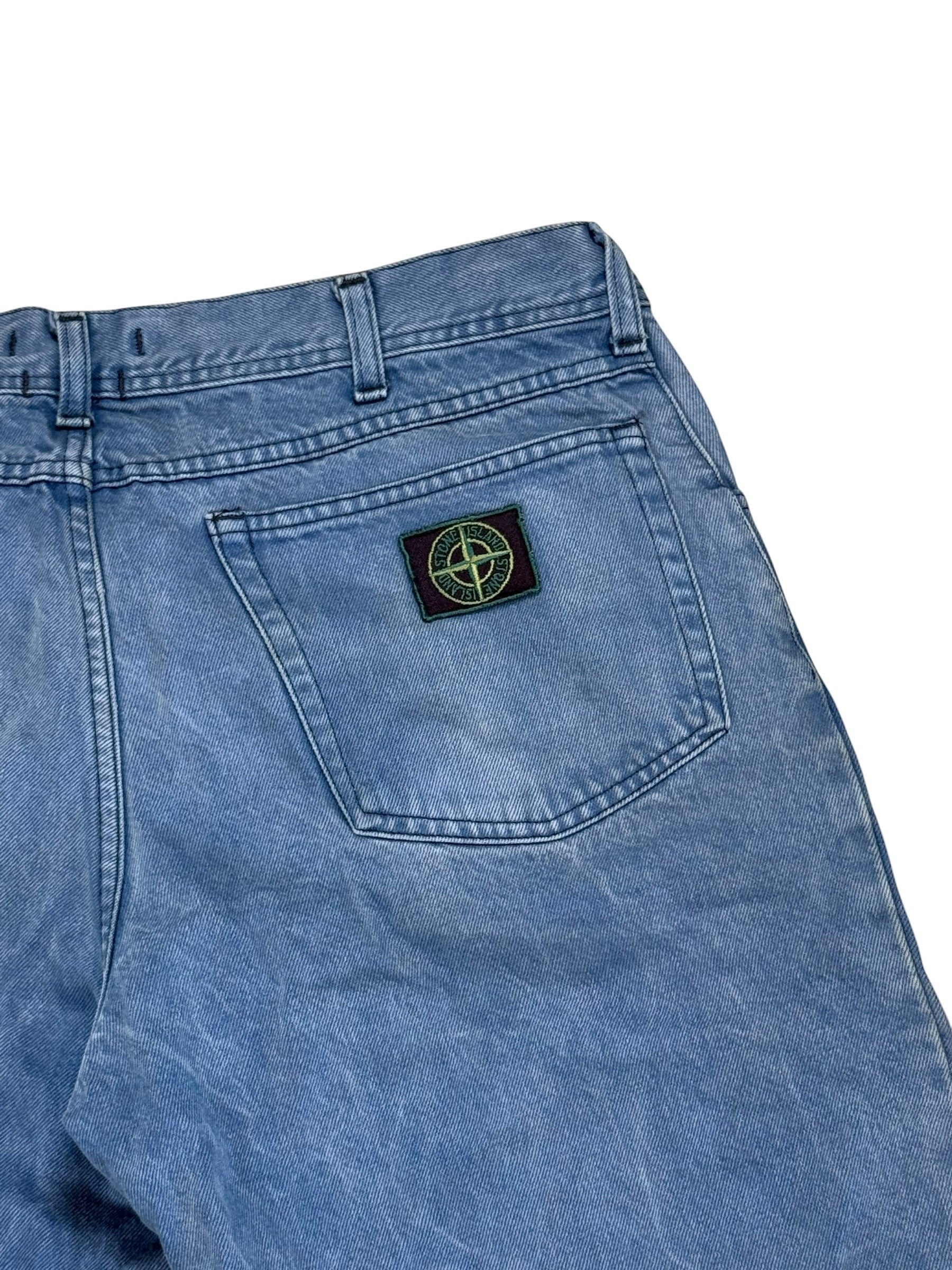 Archive No. 9 vintage light blue denim shorts with iconic Stone Island green edge badge. Size L.