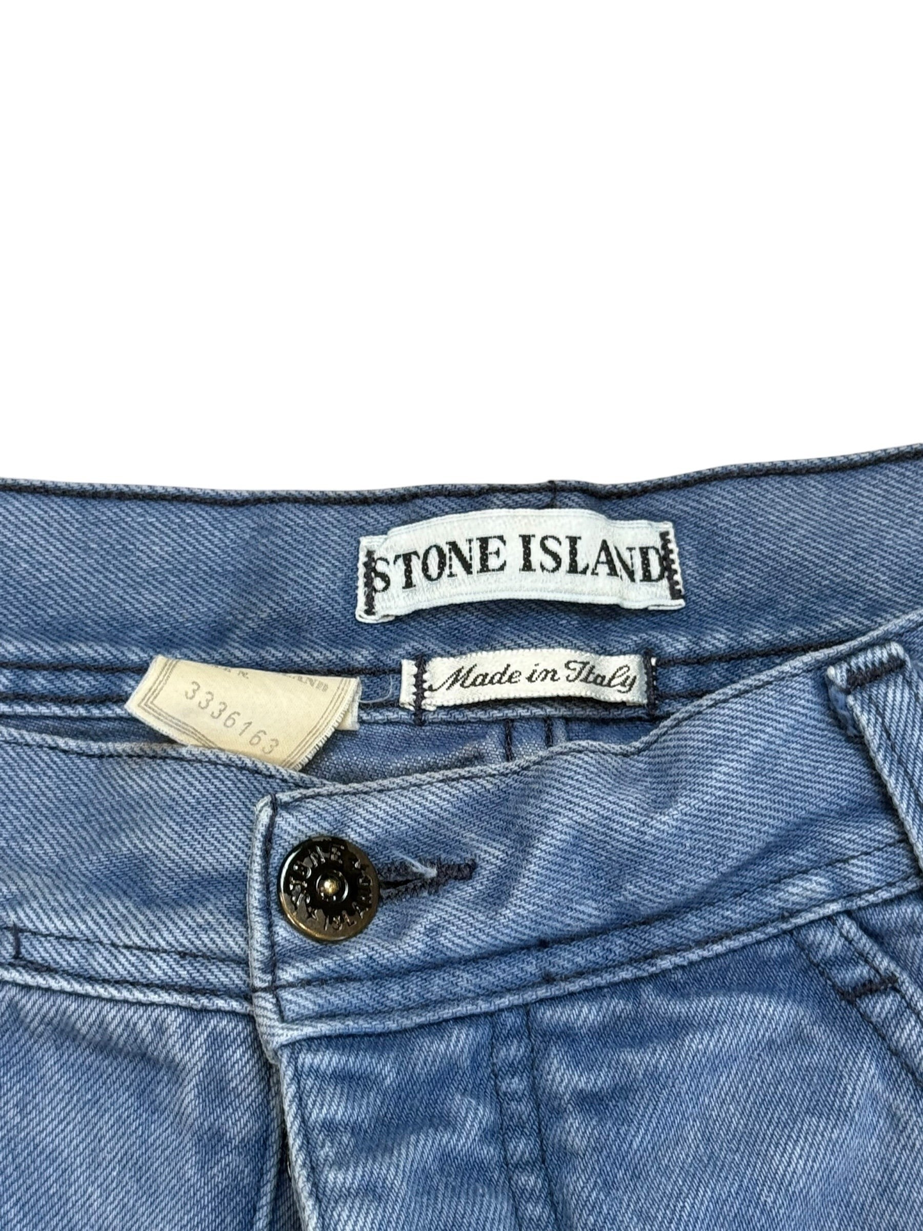 Archive No. 9 vintage Stone Island navy denim shorts, size L, featuring the iconic green edge badge from the Massimo Osti era.