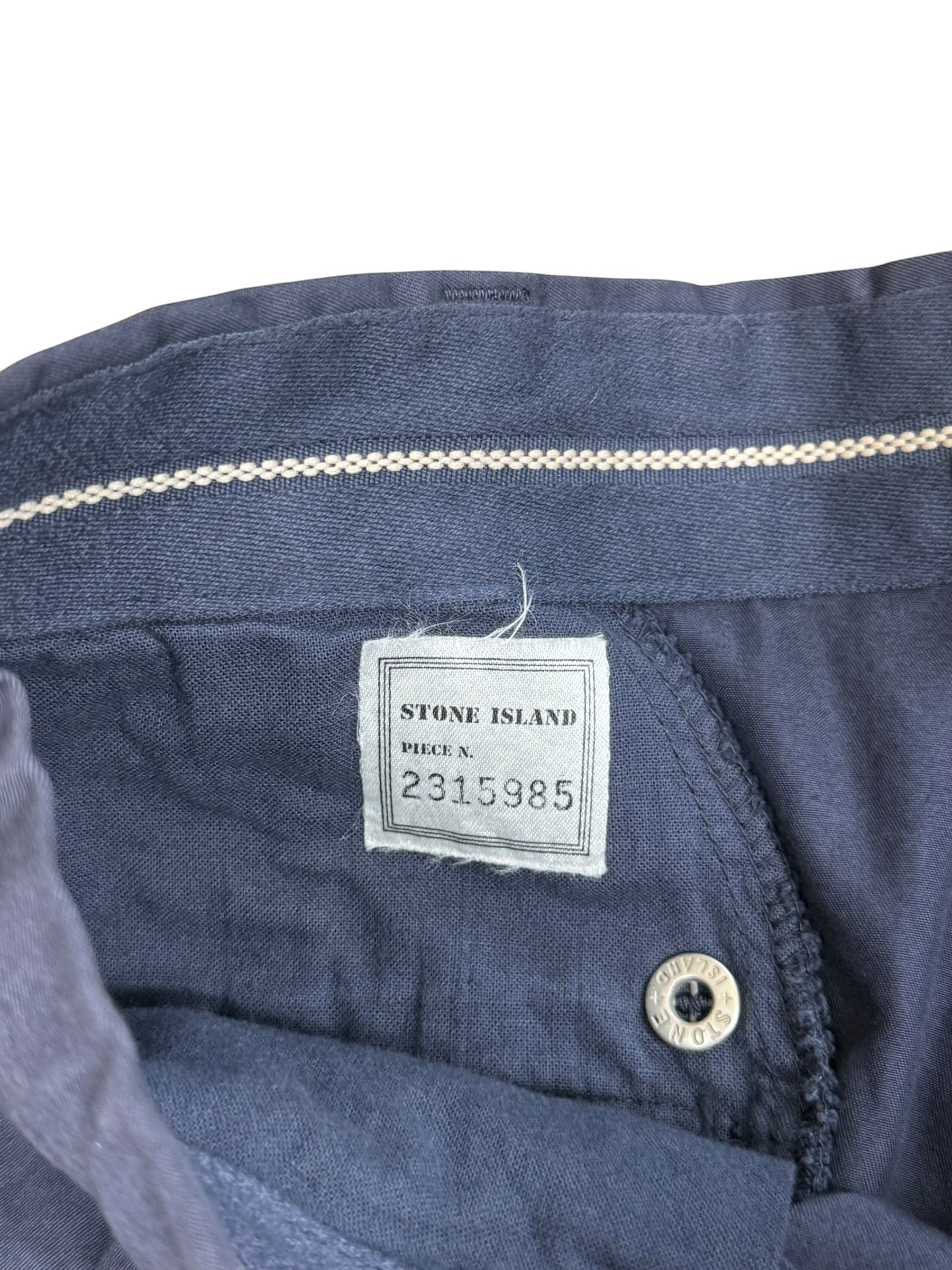 Archive No. 9 navy vintage 1995 Stone Island trousers, W30, straight leg fit, button closure with embossed logo.