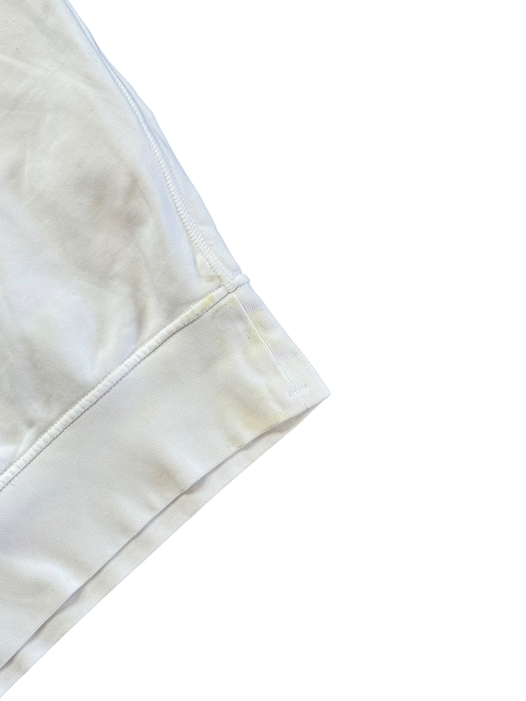 Archive No.9 Stone Island white cotton jumper hem detail showing ribbed cuff and fabric texture