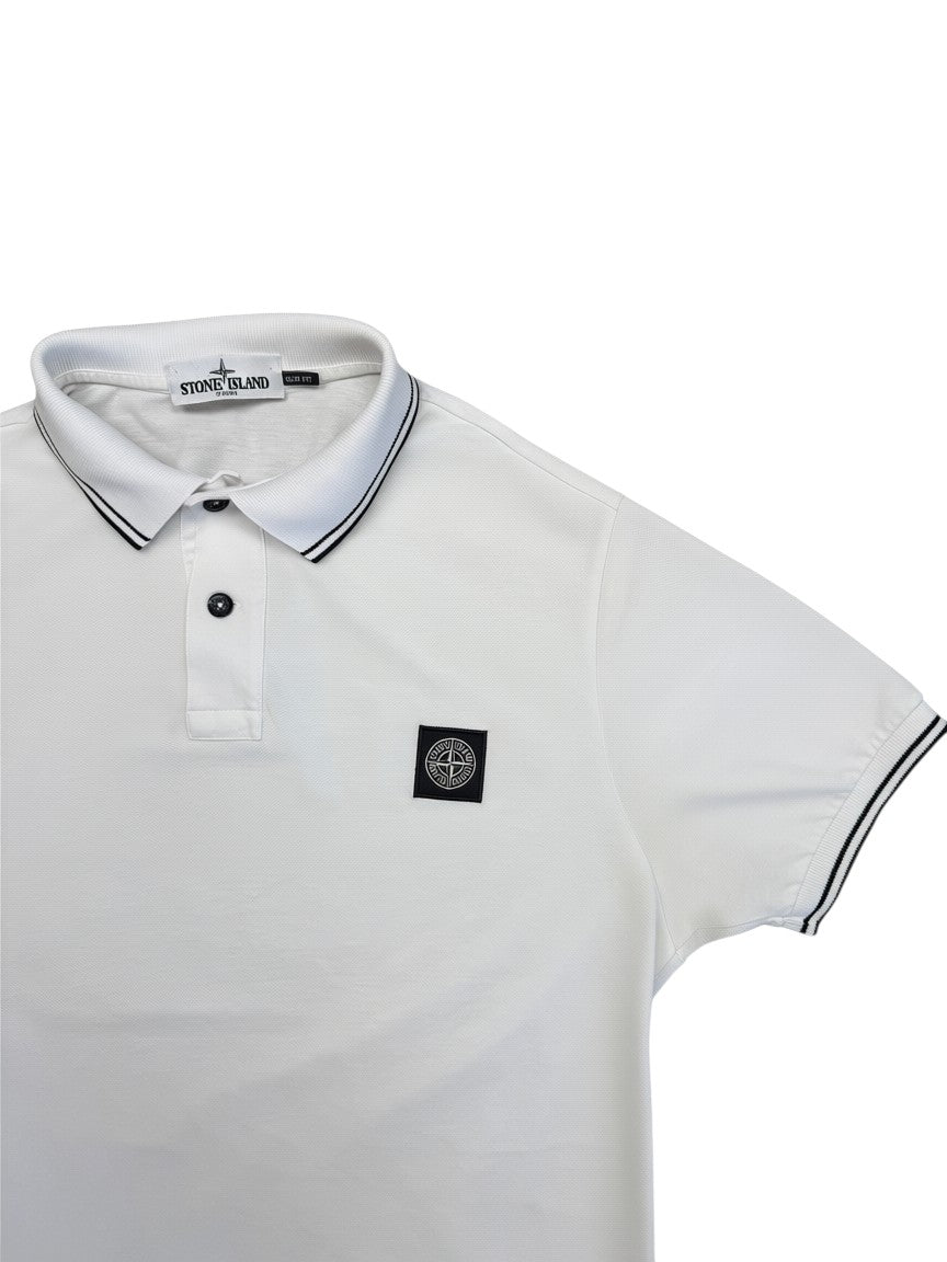 Archive No. 9 white cotton slim fit polo shirt with black trim on collar and sleeves, featuring Stone Island logo patch on chest.