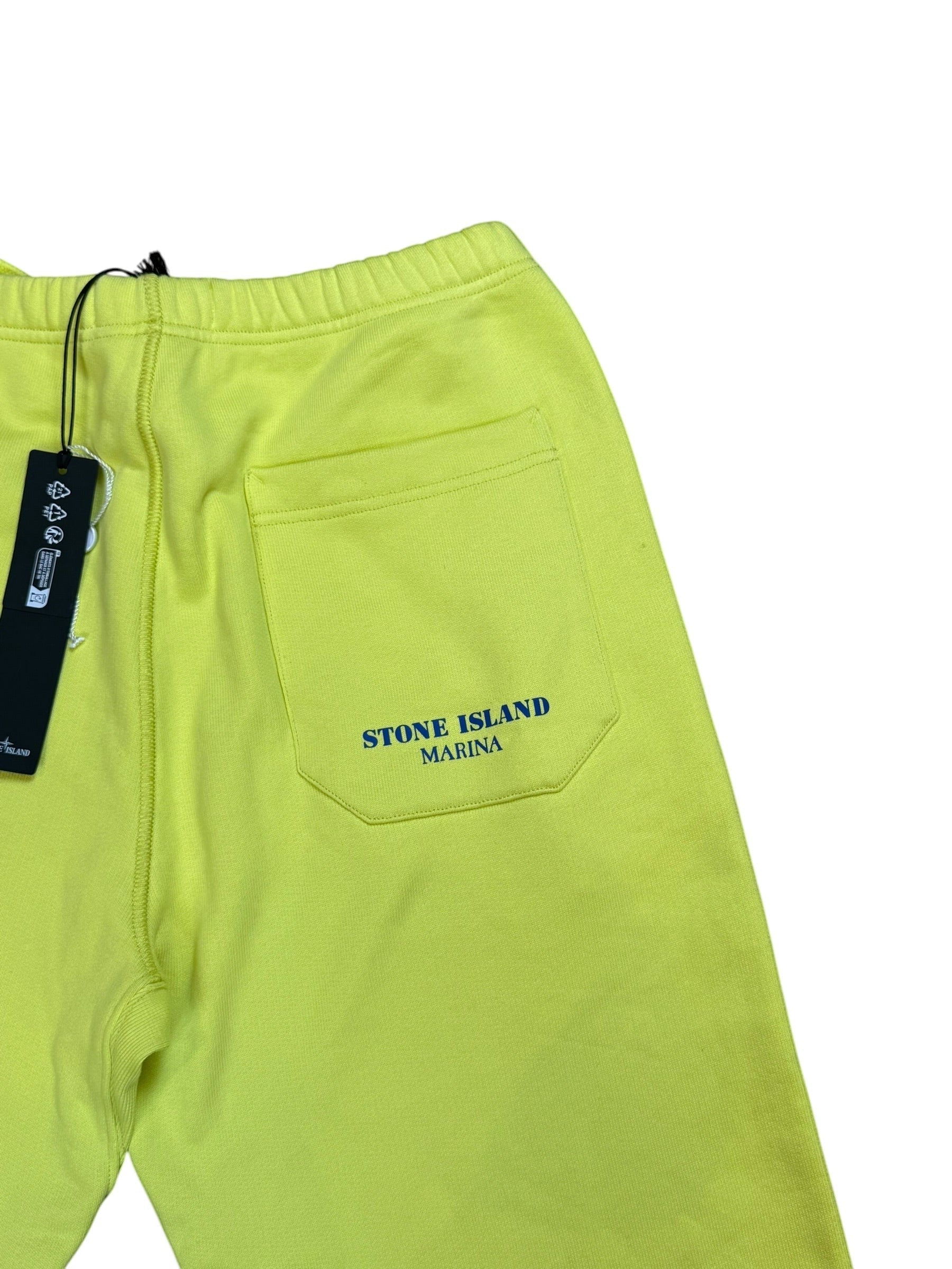 Archive No. 9: Stone Island yellow cotton joggers with elasticated waist and reflective Marina logo on back pocket.