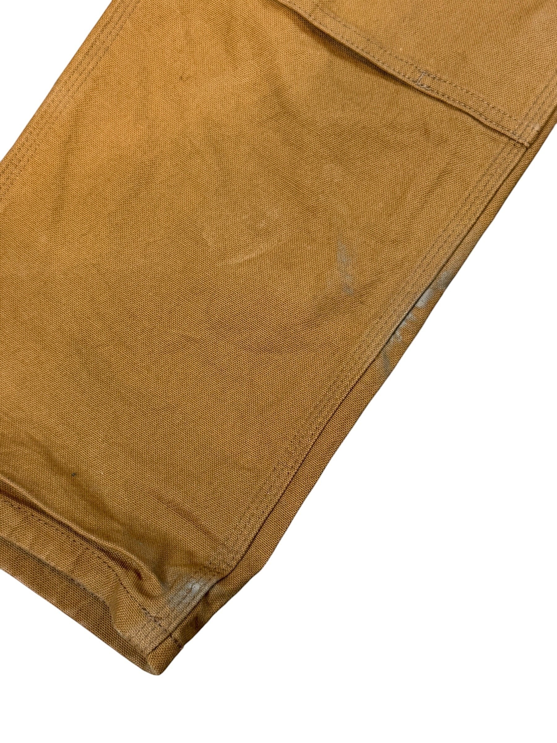 Archive No. 9 tan 99% cotton Carhartt double knee work trousers, size W38, with minor marks on legs.