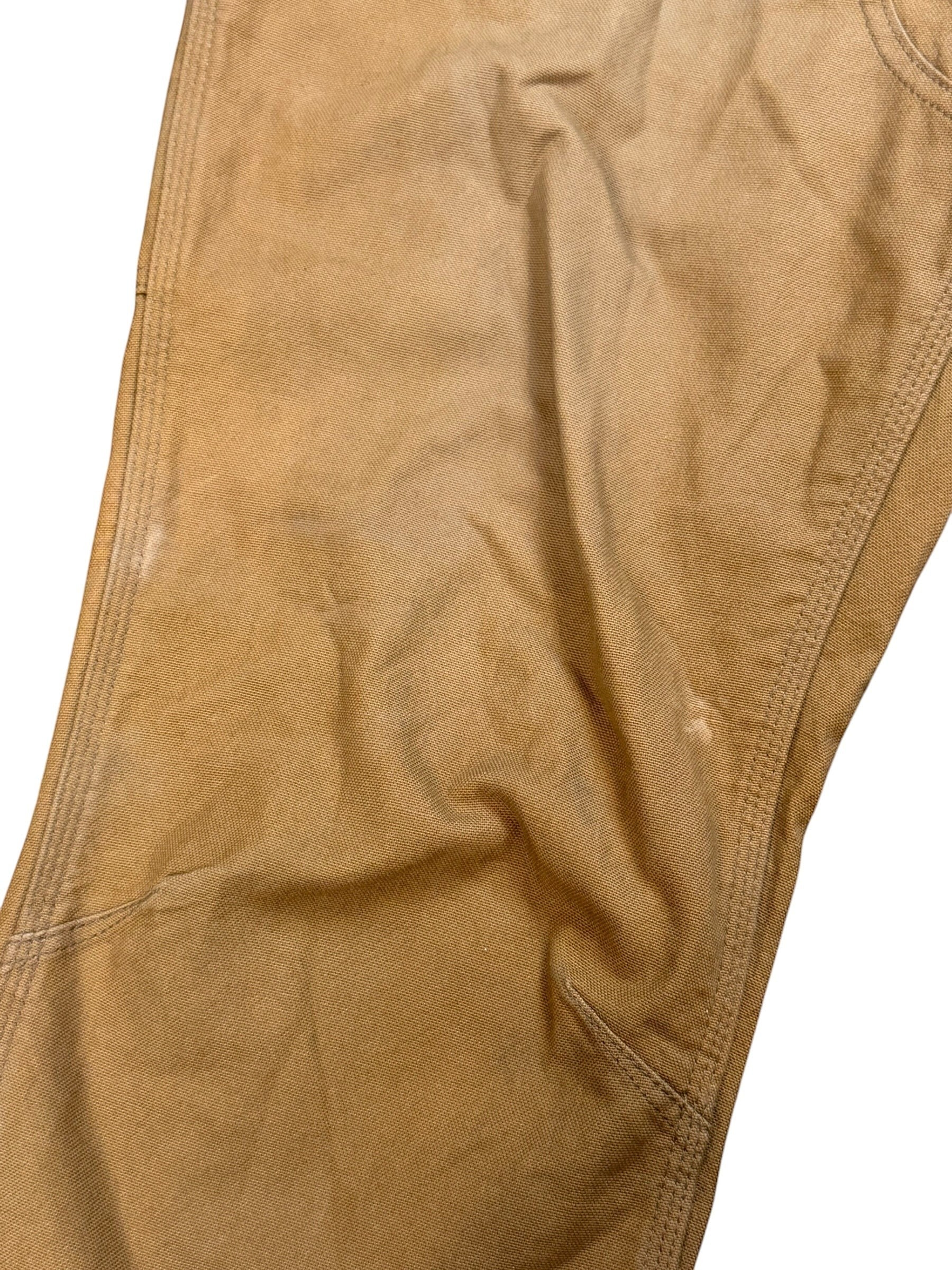 Archive No. 9 vintage tan Carhartt double knee work trousers, 99% cotton, size W38. Features subtle marks on legs.