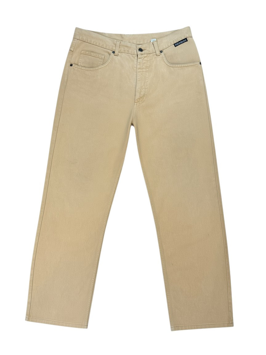 Archive No. 9 vintage tan 100% cotton Yves Saint Laurent trousers, size W36, with a straight cut fit and leather patch on the back.
