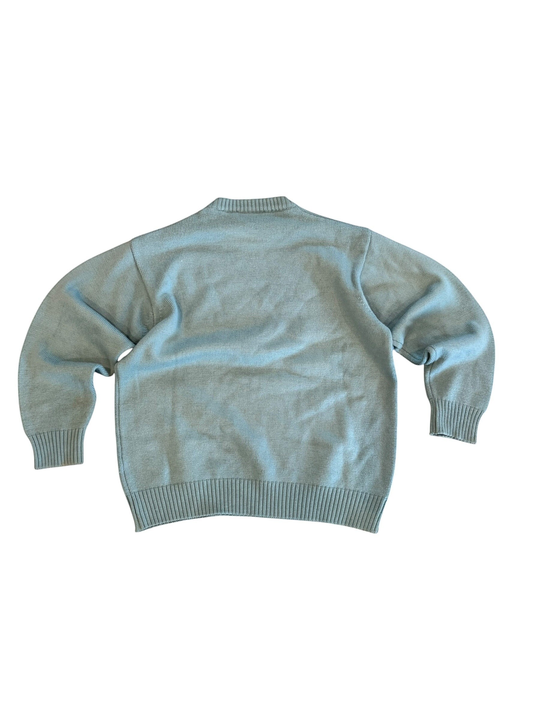 Archive No. 9 Valentino medium teal blue Knit Jumper with ribbed cuffs and hem. Durable knit construction.