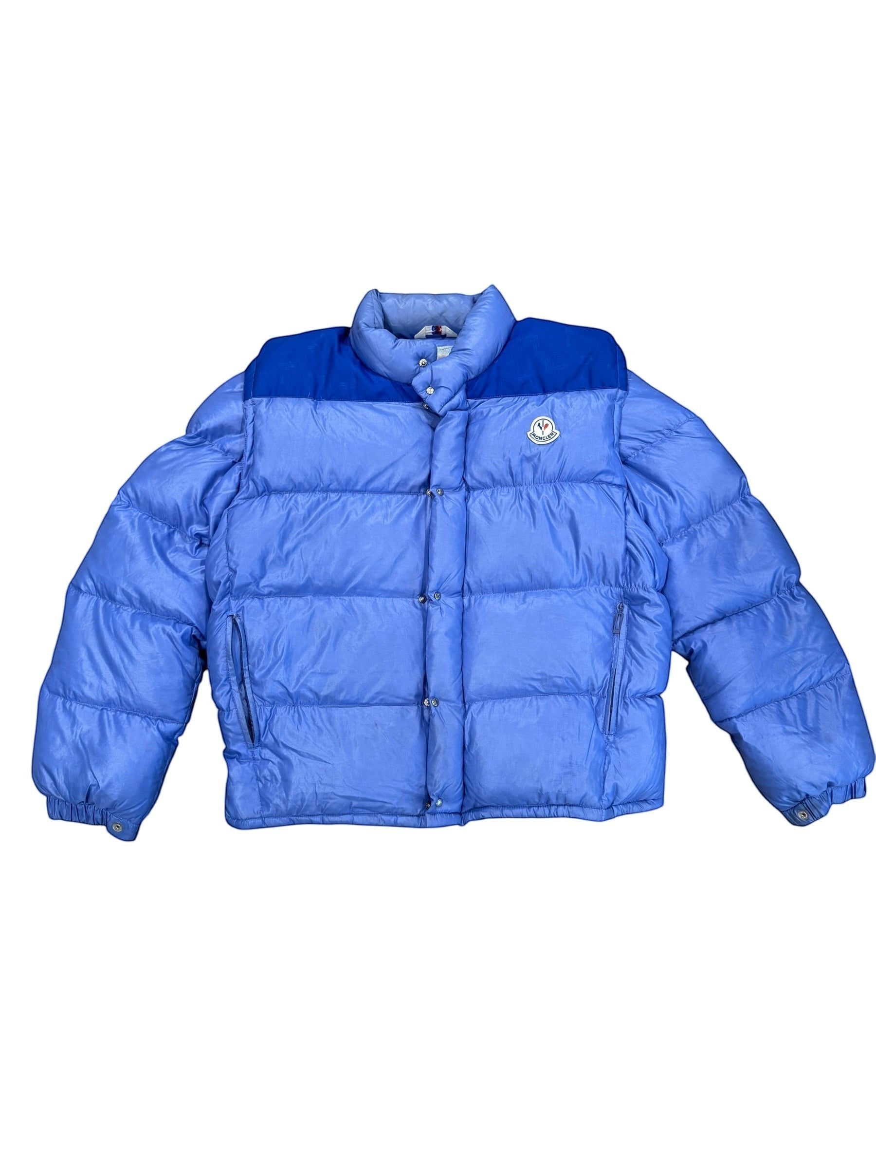 Archive No. 9 vintage blue down-filled puffer jacket with contrasting blue shoulders and Moncler logo patch.