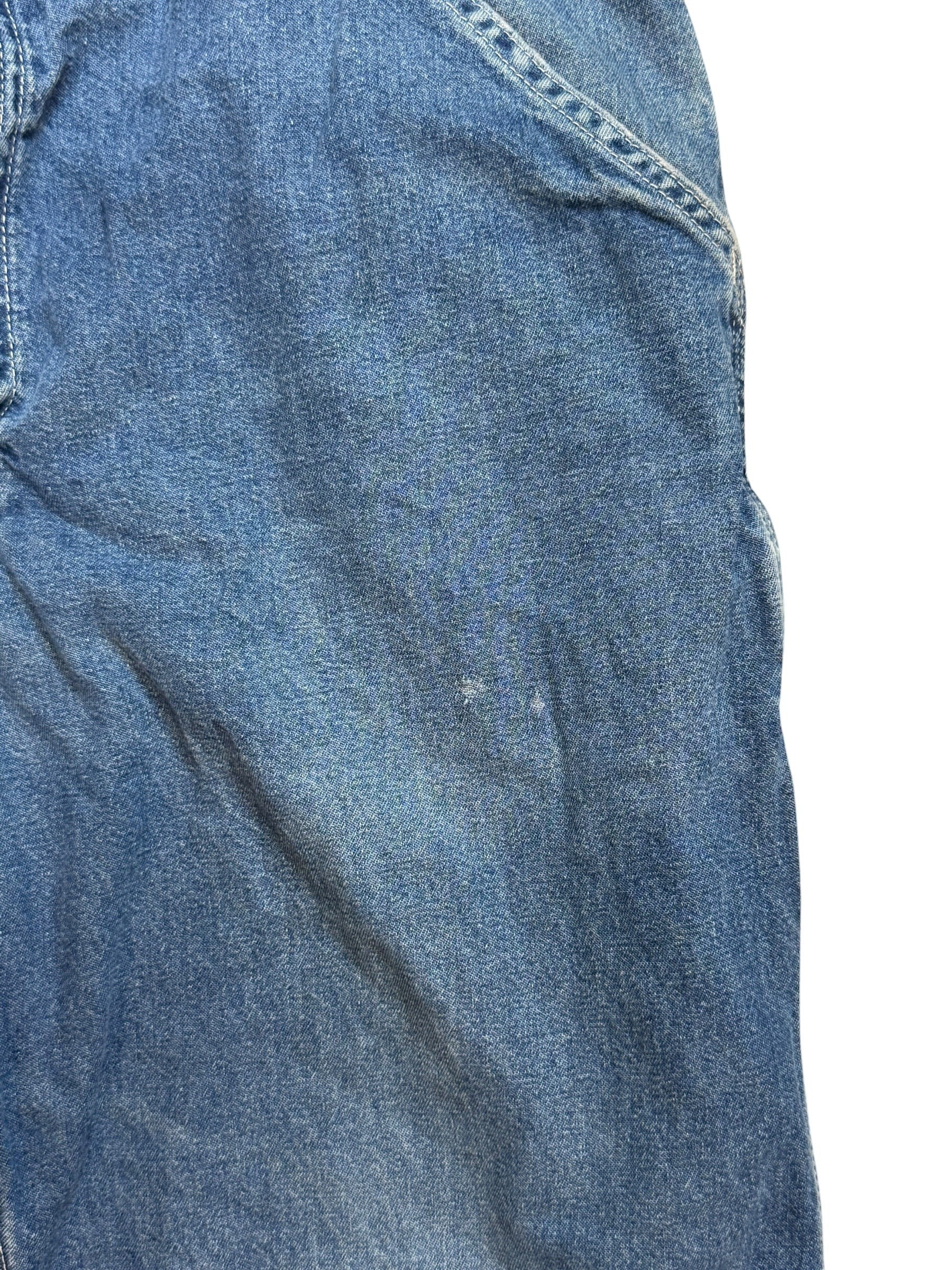 Archive No. 9 vintage navy denim jeans, size W36, featuring a straight cut fit and iconic leather patch detail.