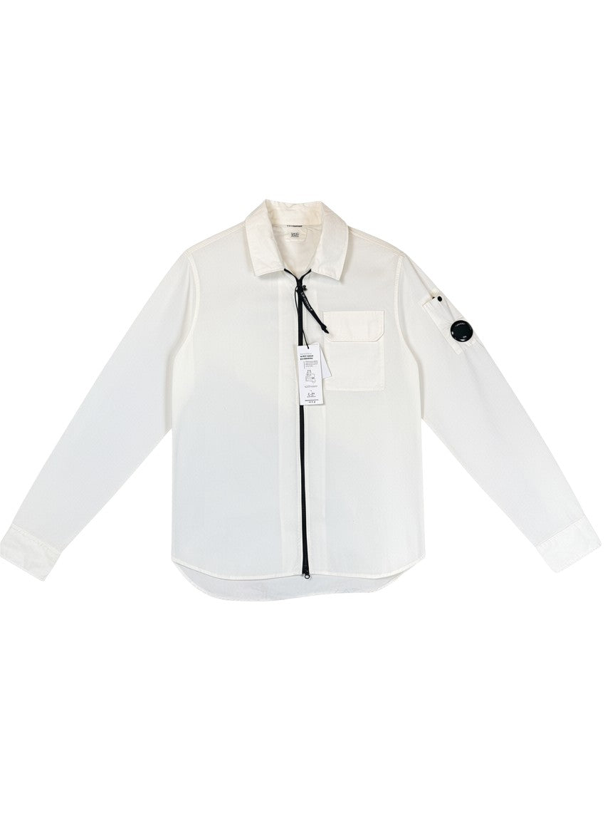 Archive No. 9 white C.P. Company lightweight zip-up overshirt with iconic arm lens detail. Size L.