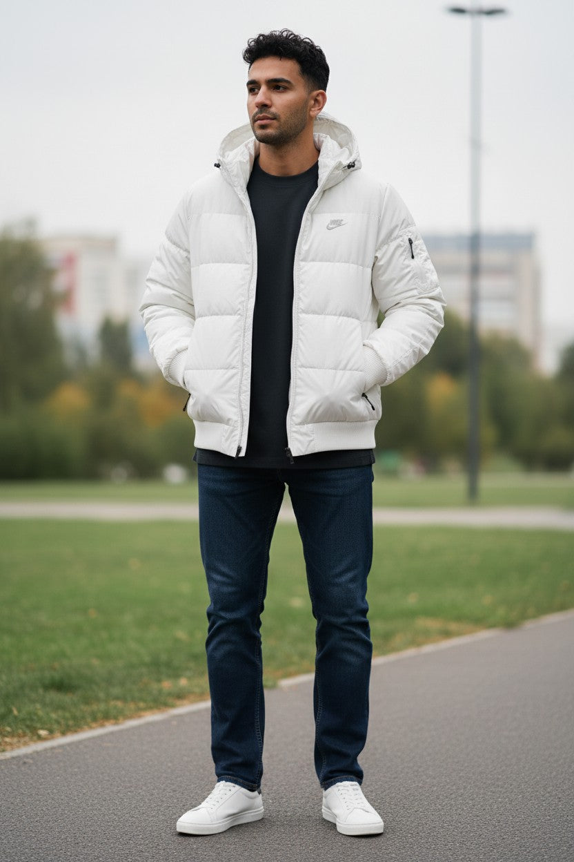 Archive No. 9 white Nike down puffer jacket with hood, size XL. Features wind resistance and down filling.
