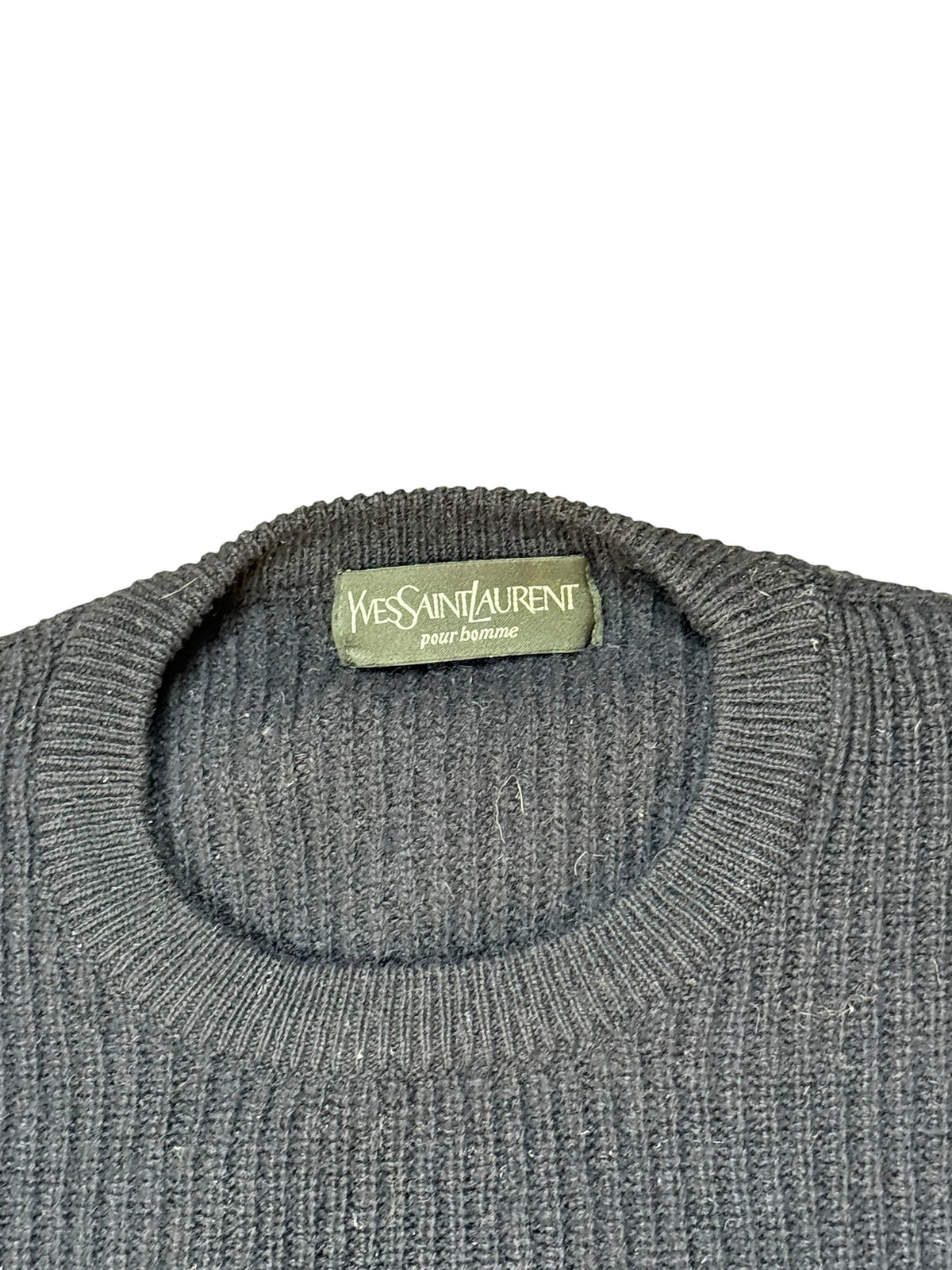 Archive No.9 vintage Yves Saint Laurent navy knit jumper with ribbed design and iconic badge. Size M.