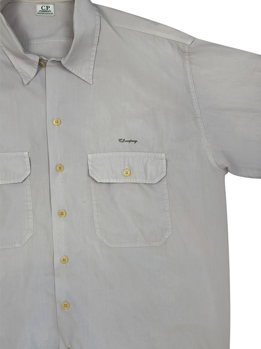 Archive No. 9 C.P. Company 1990s purple cotton shirt with two chest pockets and button closure. Iconic Massimo Osti era.